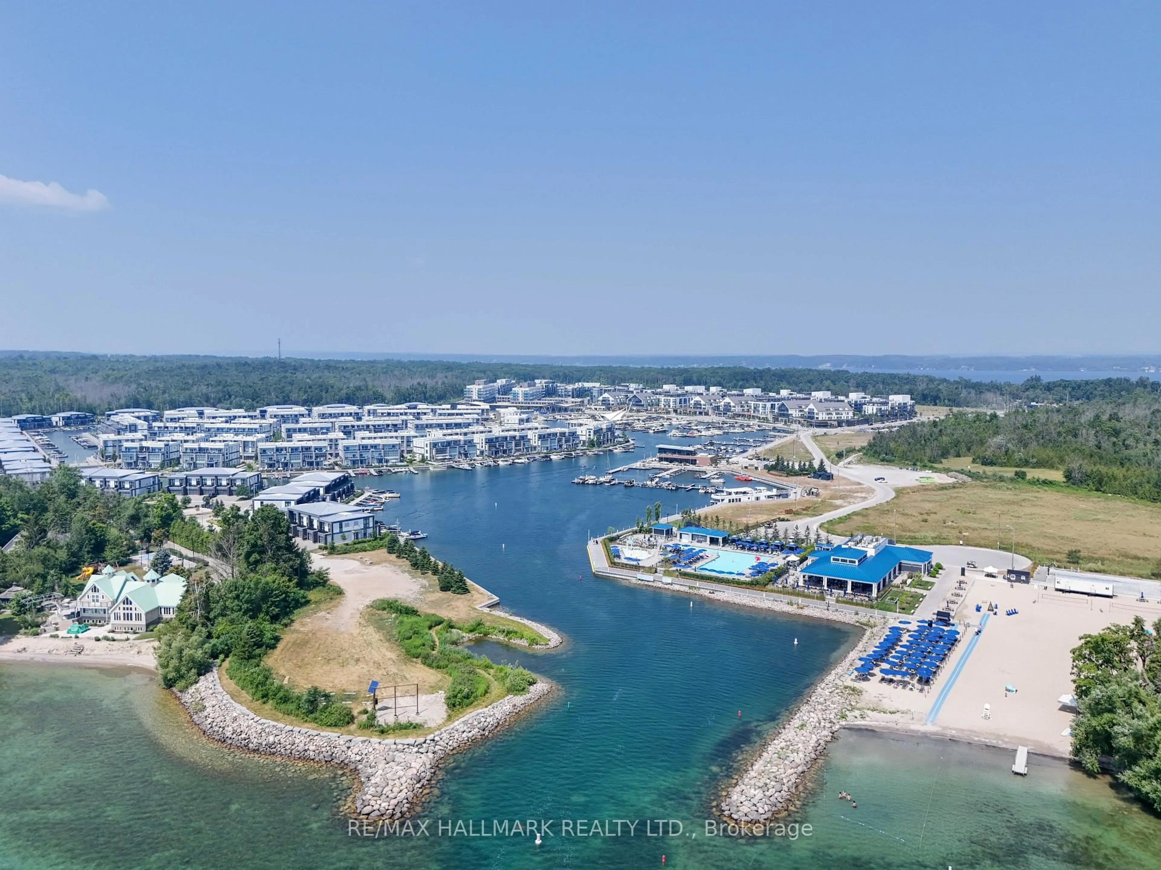 A pic from outside/outdoor area/front of a property/back of a property/a pic from drone, water/lake/river/ocean view for 415 Sea Ray Ave #337, Innisfil Ontario L9S 0R5