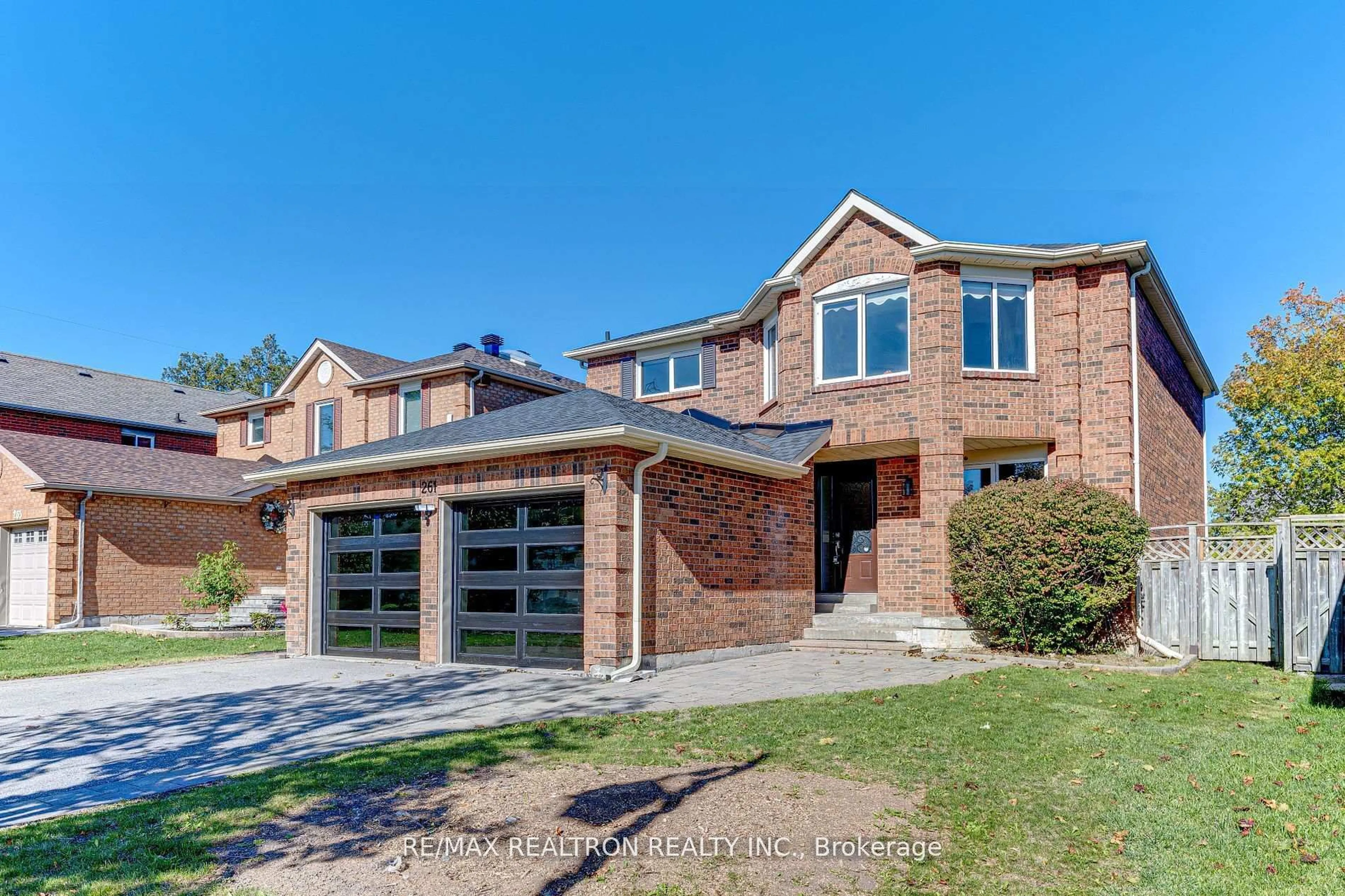 Home with brick exterior material, street for 261 Hollingham Rd, Markham Ontario L3R 8J7