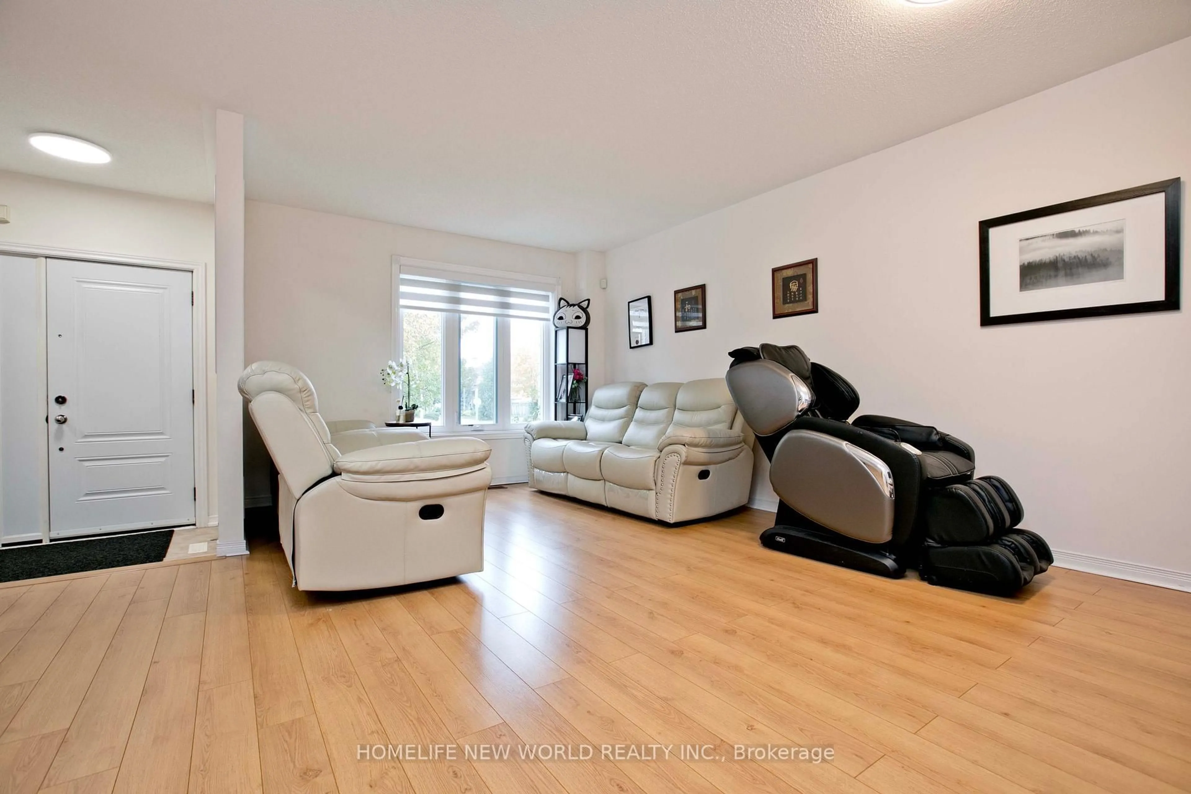 Living room with furniture, wood/laminate floor for 293 Mingay Ave, Markham Ontario L6E 1T5