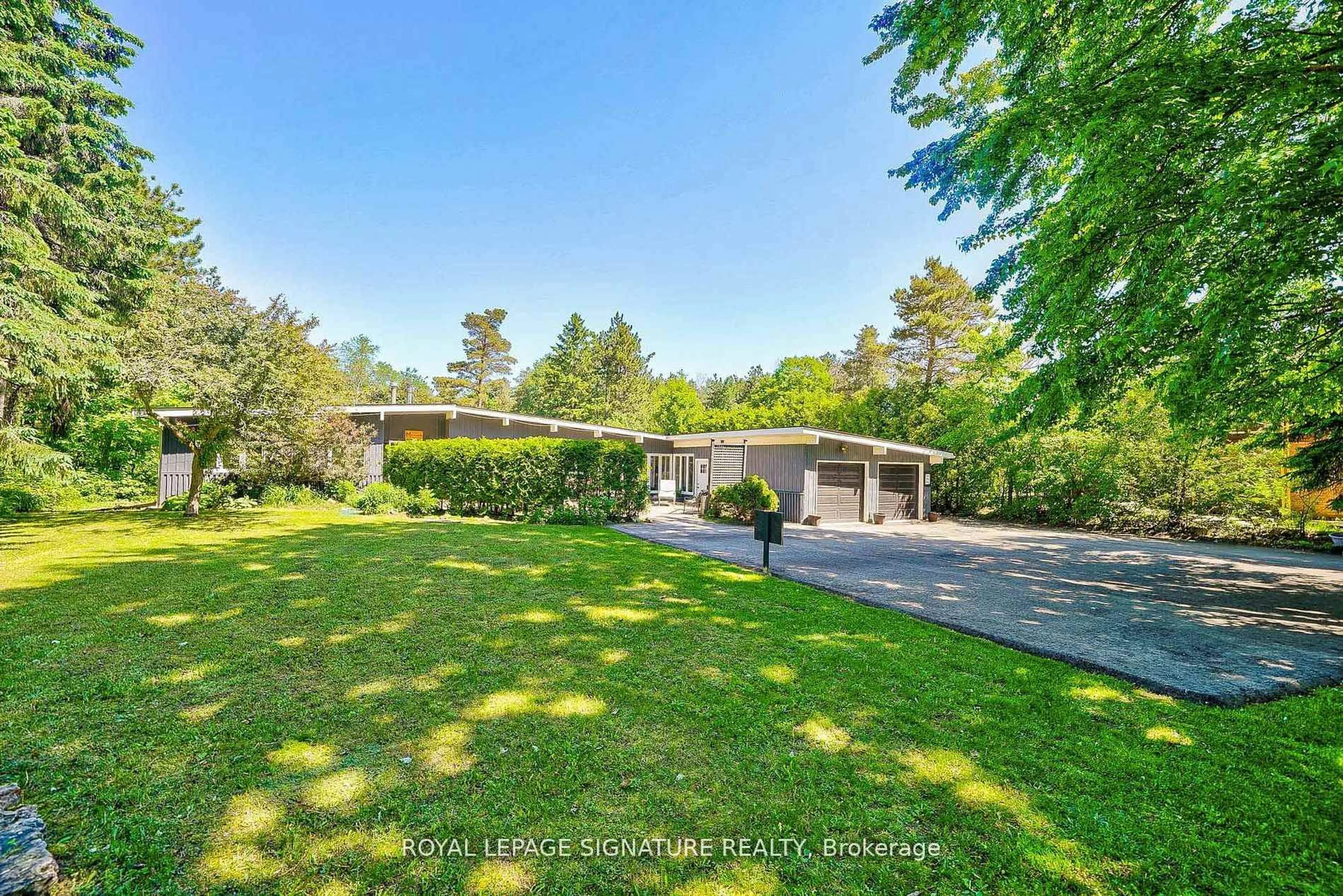 A pic from outside/outdoor area/front of a property/back of a property/a pic from drone, forest/trees view for 6554 9th Line, New Tecumseth Ontario L0G 1A0