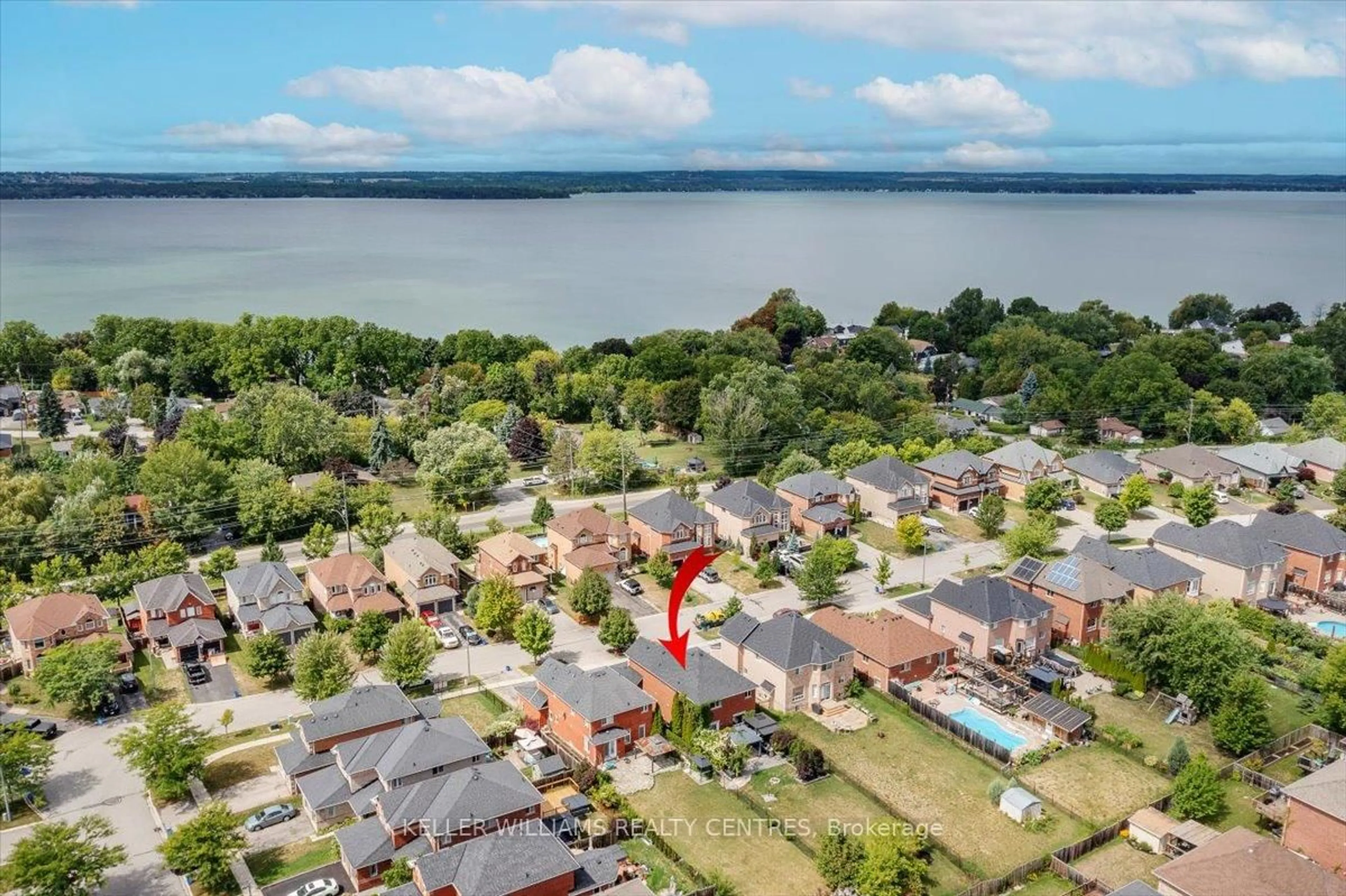A pic from outside/outdoor area/front of a property/back of a property/a pic from drone, water/lake/river/ocean view for 63 Kerfoot Cres, Georgina Ontario L4P 4H2