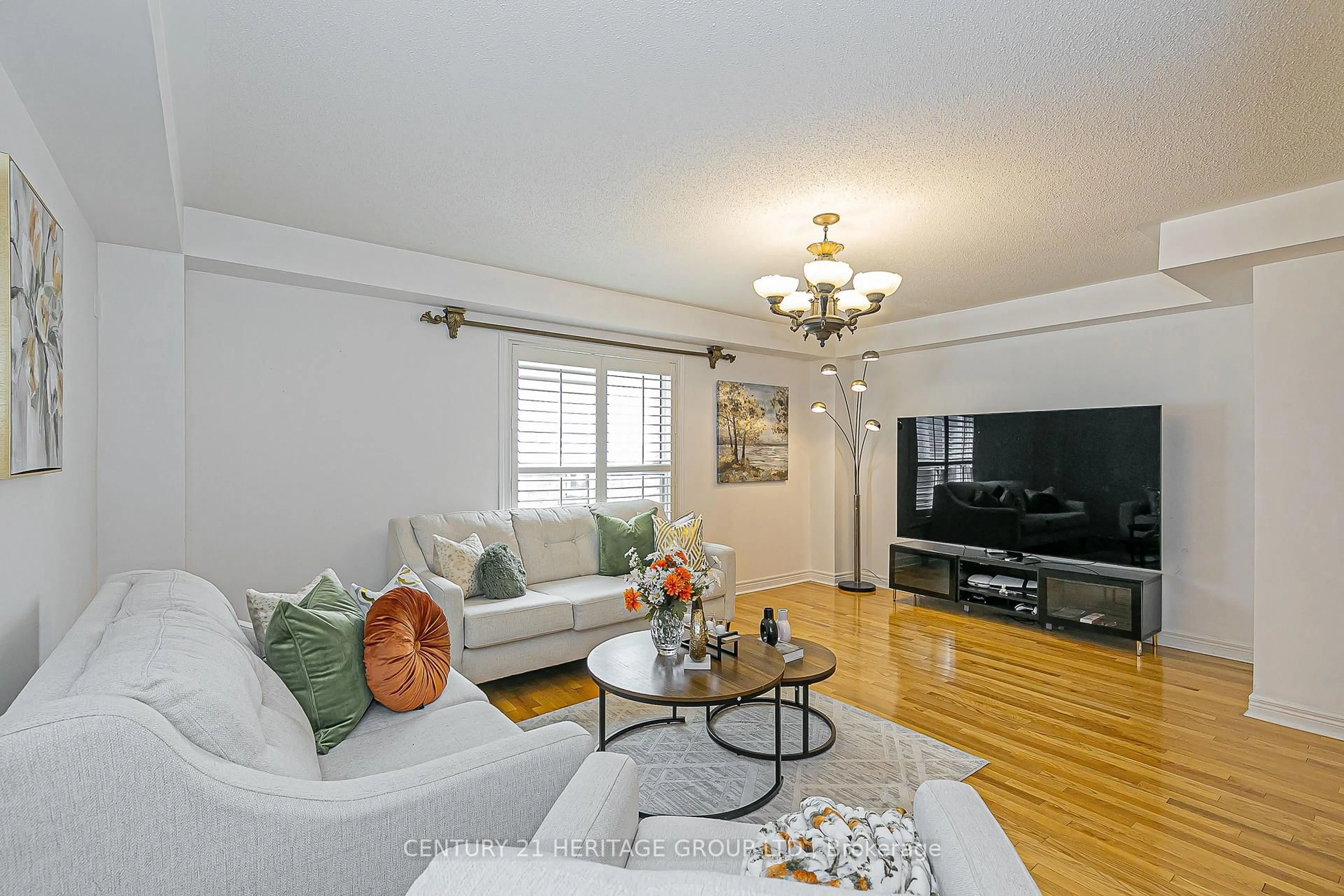 Living room with furniture, wood/laminate floor for 29 Eminence Rd, Vaughan Ontario L4K 5K1