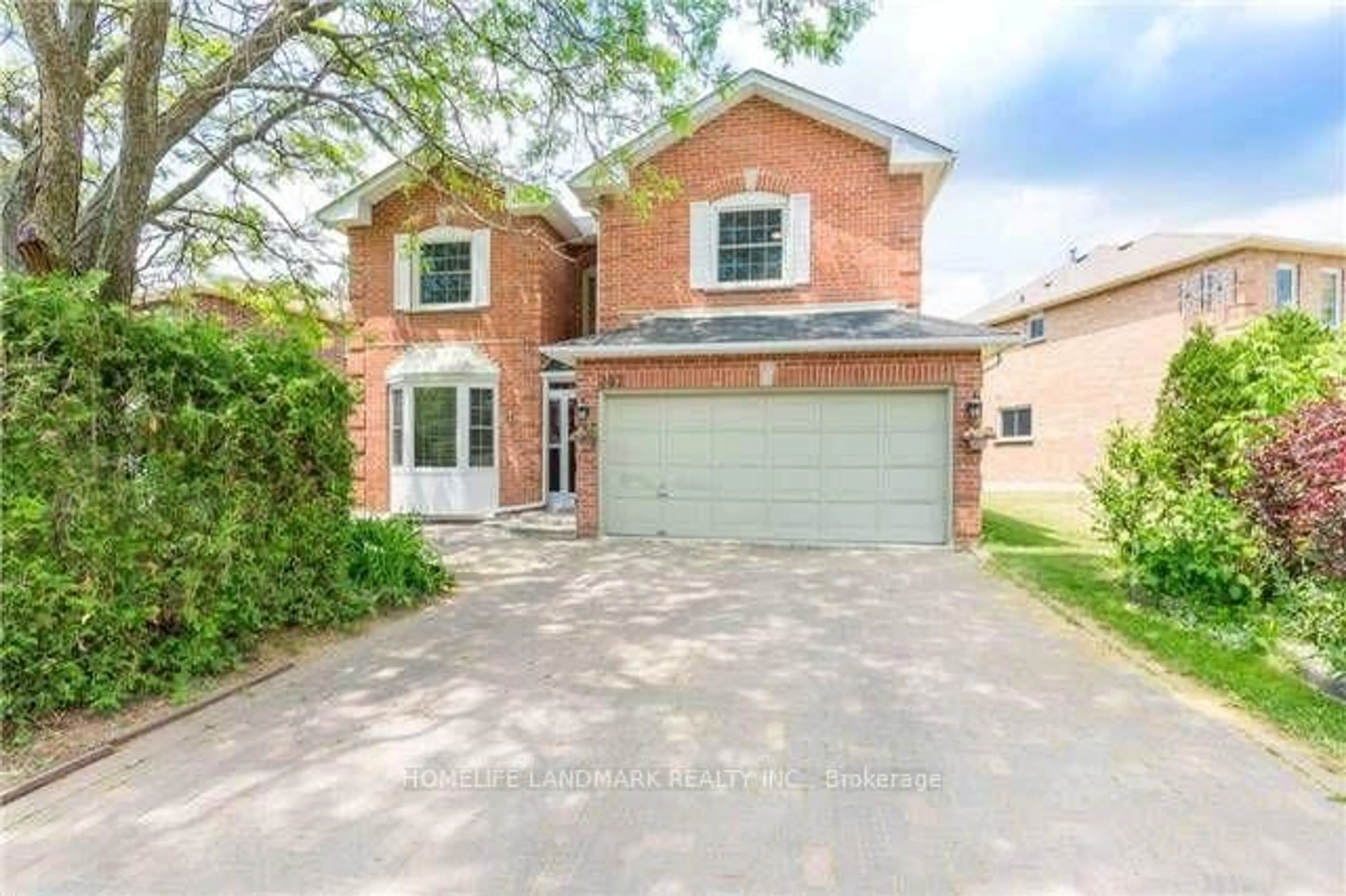 Home with brick exterior material, street for 242 Raymerville Dr, Markham Ontario L3P 6S1