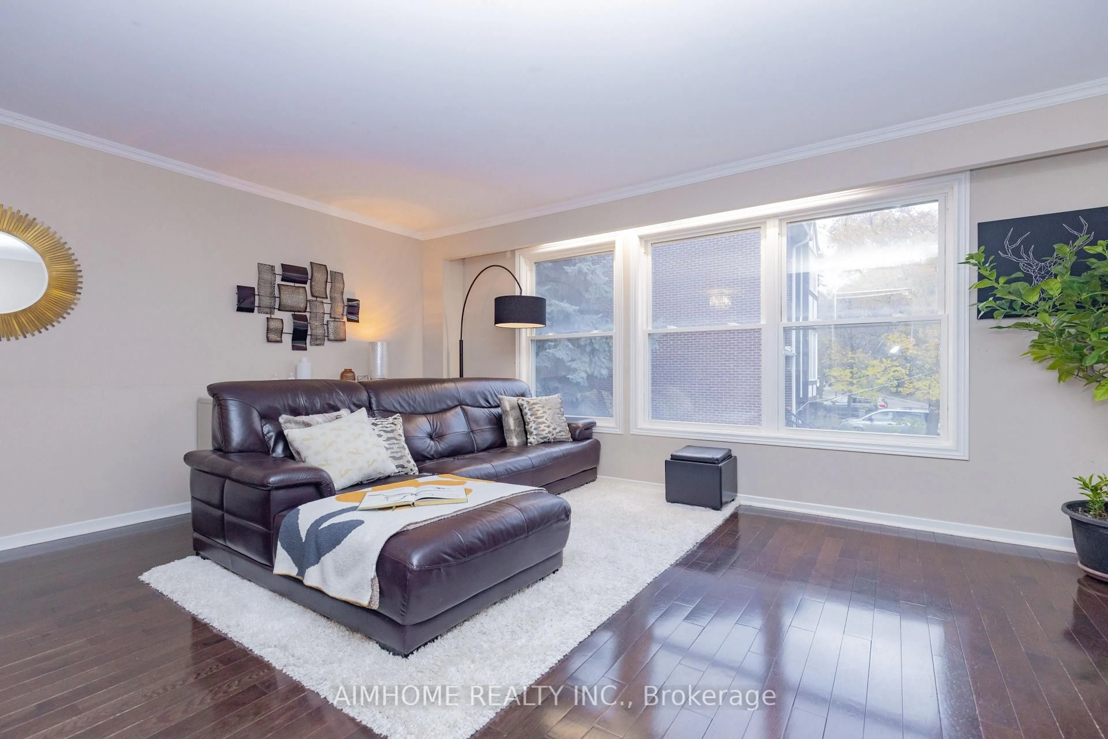 Living room with furniture, wood/laminate floor for 362 Simonston Blvd, Markham Ontario L3T 4T5