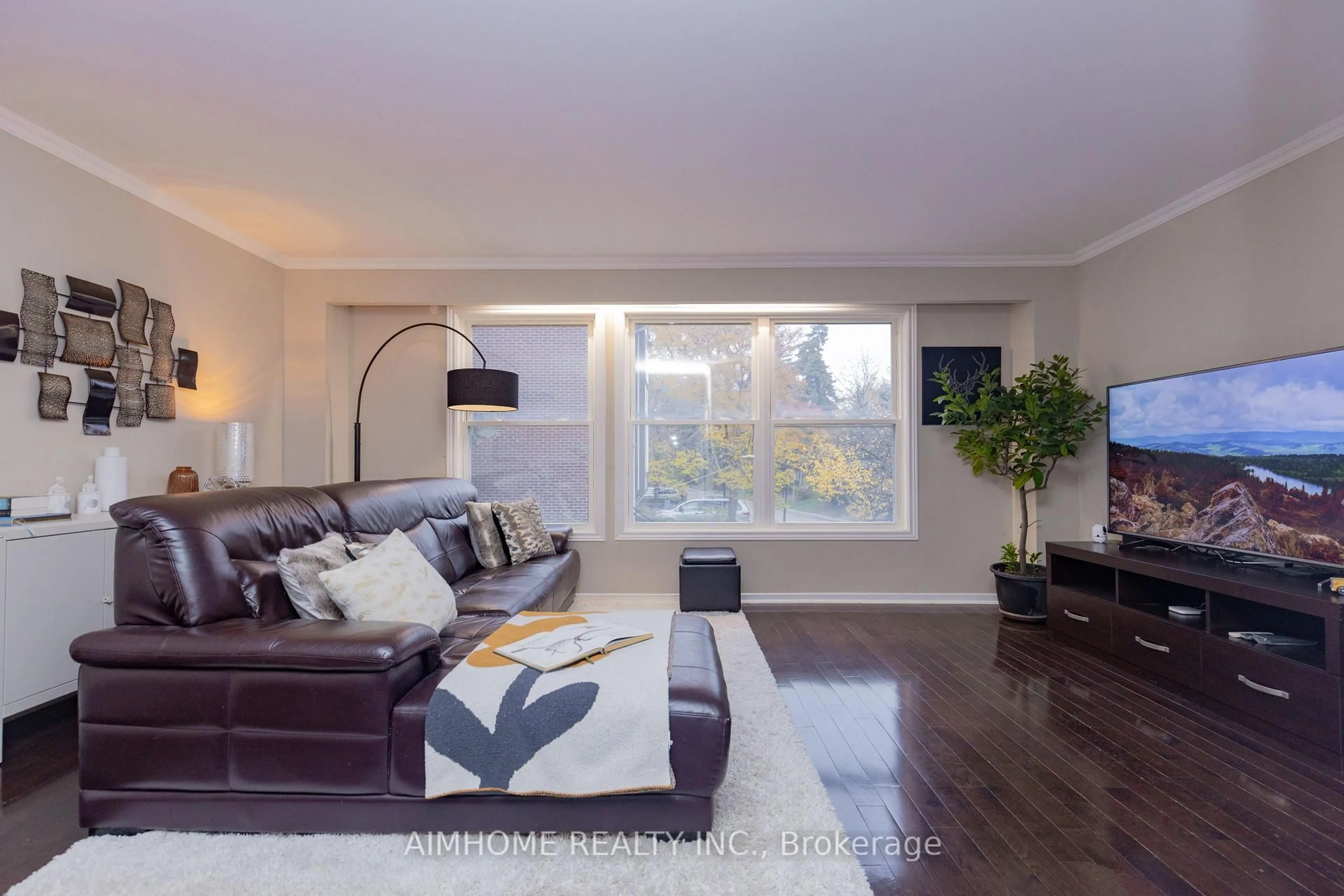 Living room with furniture, wood/laminate floor for 362 Simonston Blvd, Markham Ontario L3T 4T5