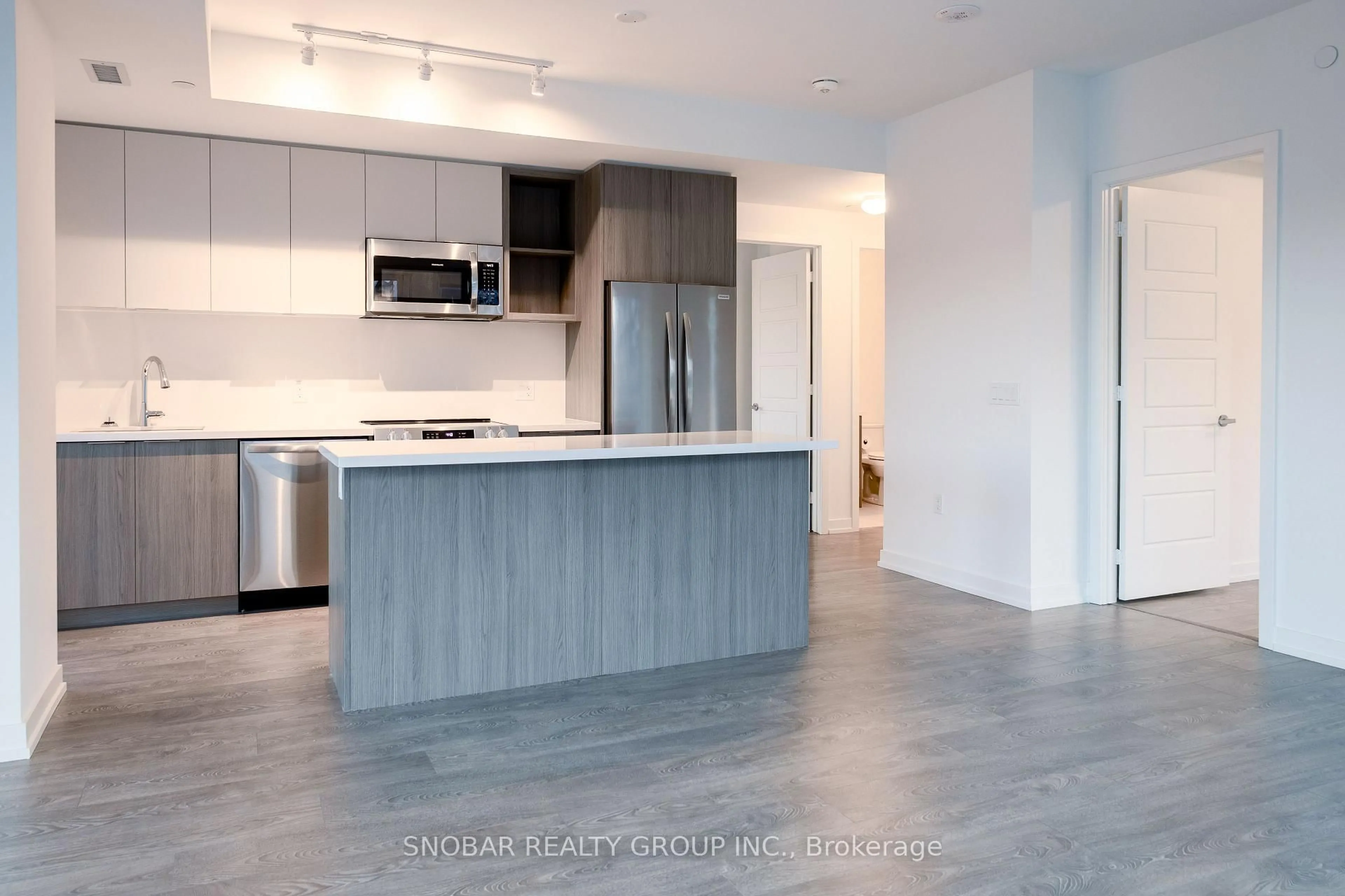 Open concept kitchen, unknown for 333 Sunseeker Ave #317, Innisfil Ontario L9S 0J7