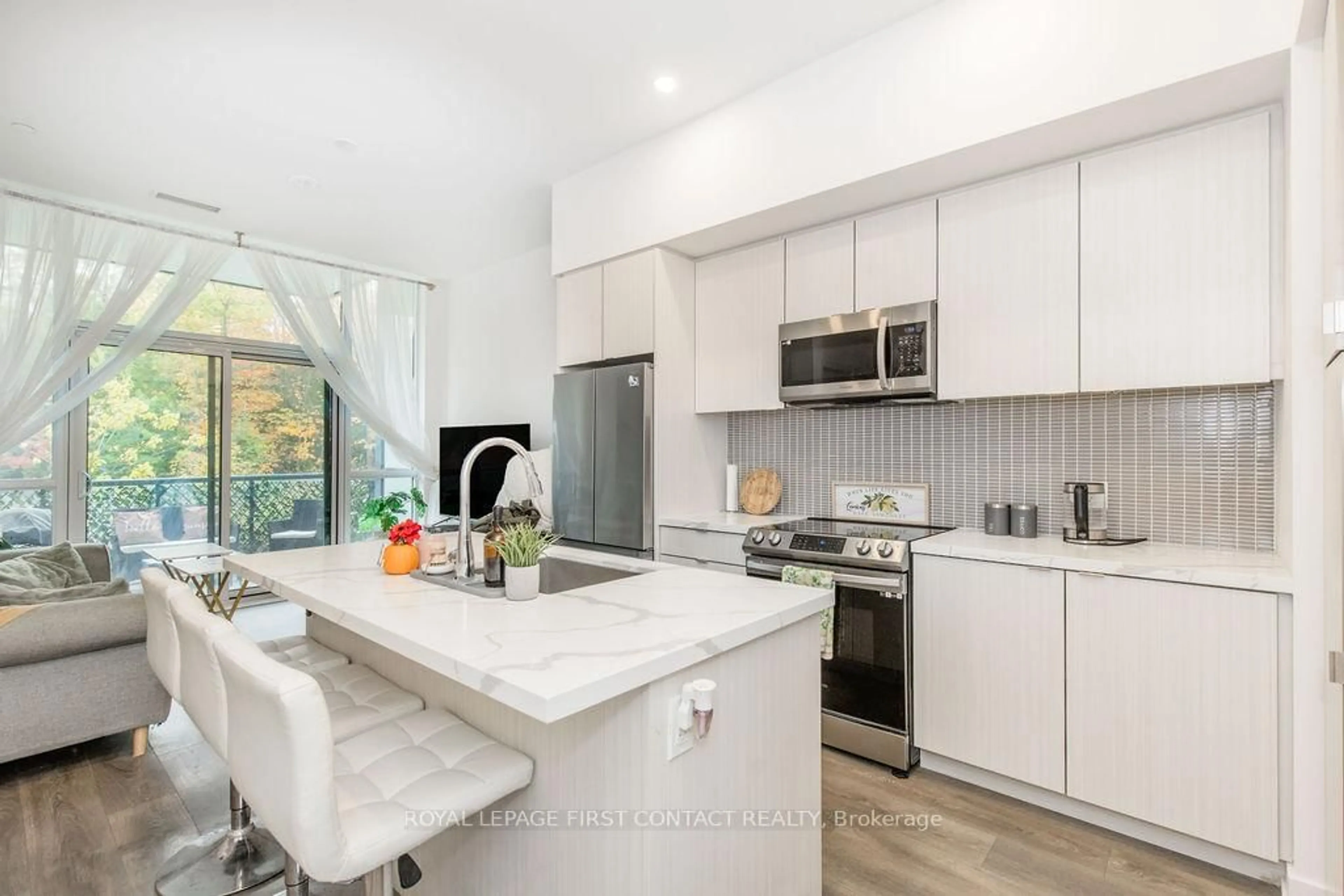 Open concept kitchen, ceramic/tile floor for 415 Sea Ray Ave #146, Innisfil Ontario L9S 0R5