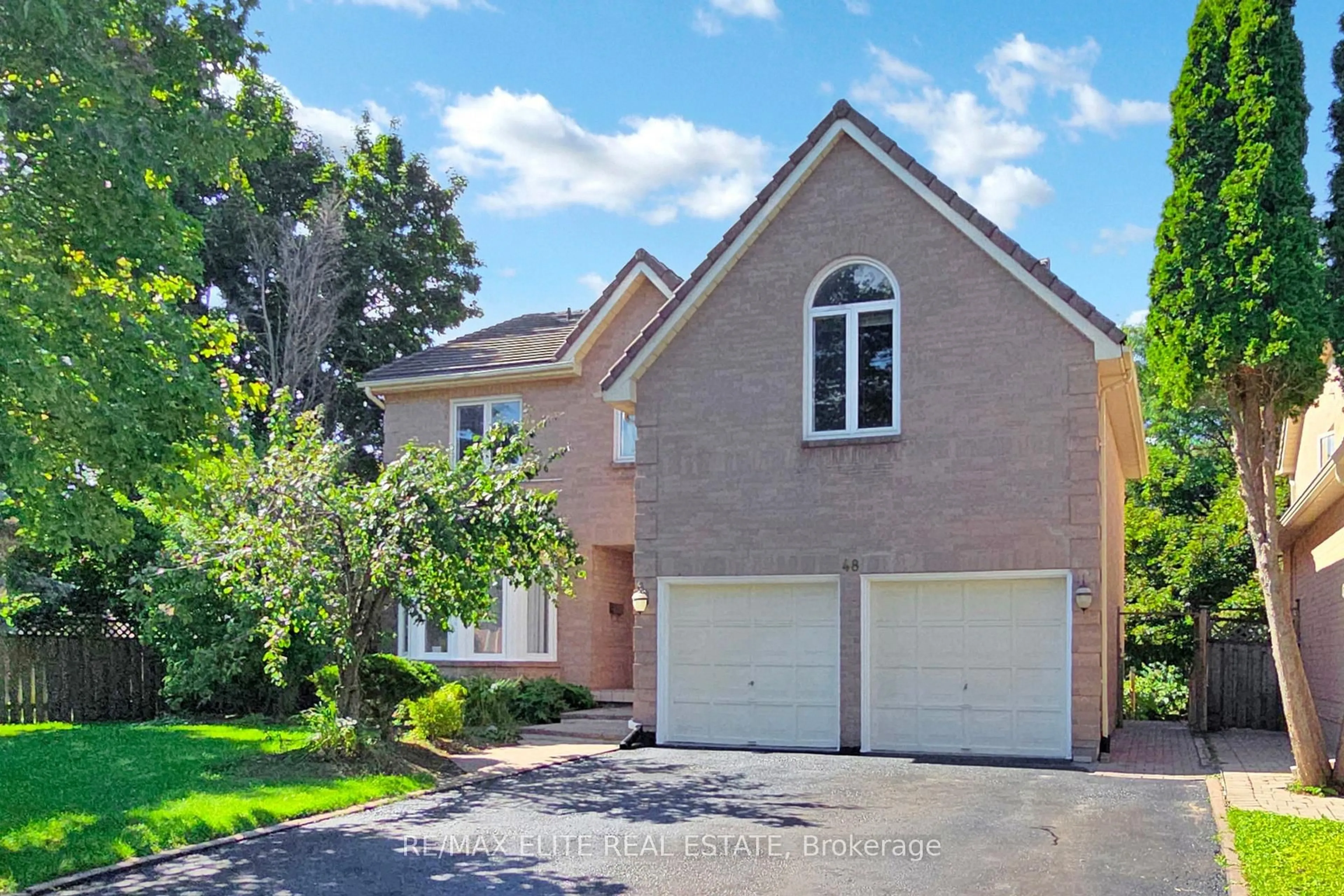 Home with brick exterior material, street for 48 John Button Blvd, Markham Ontario L3R 9A6
