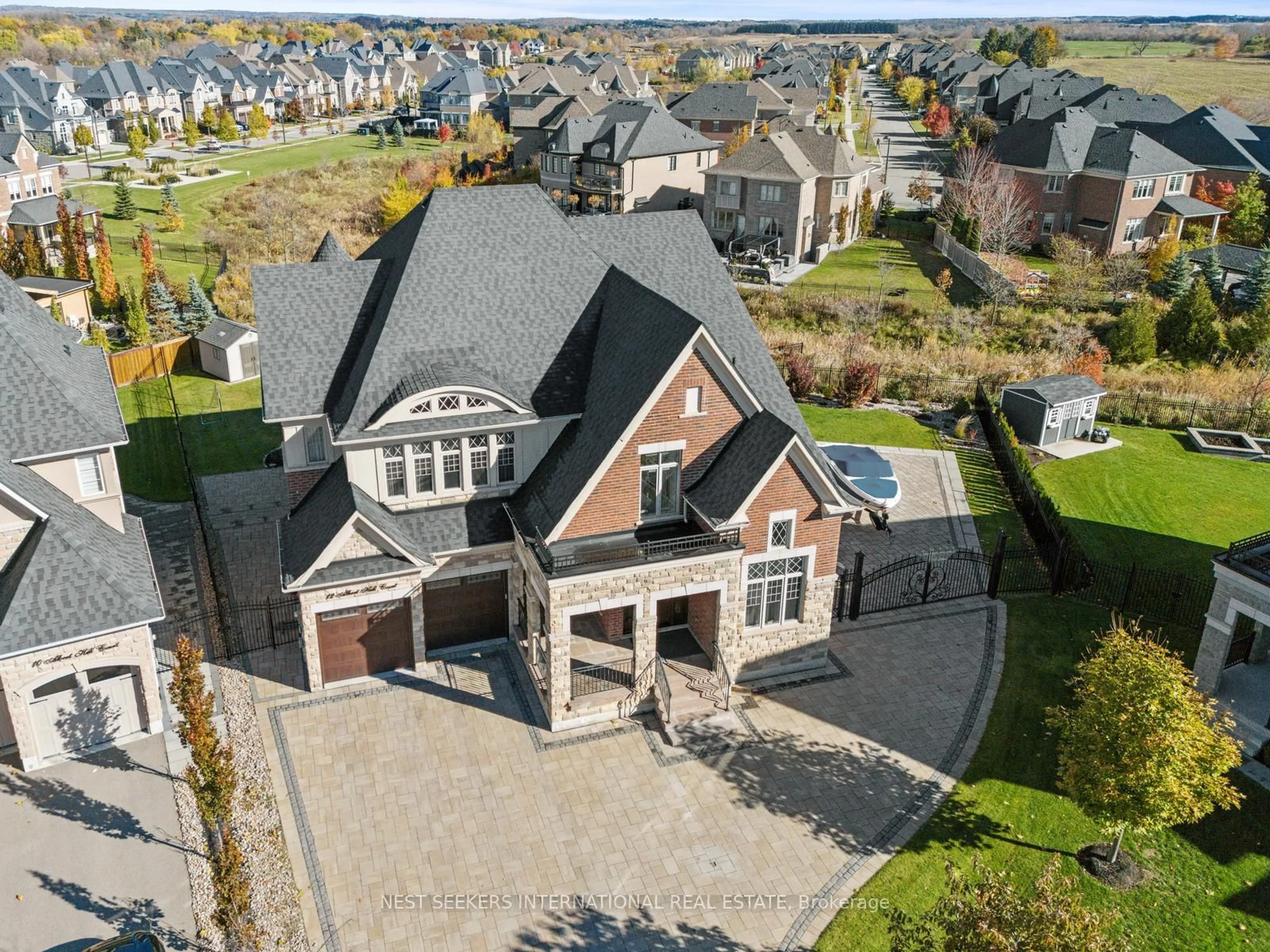 A pic from outside/outdoor area/front of a property/back of a property/a pic from drone, street for 12 Albert Hill Crt, King Ontario L7B 0P1