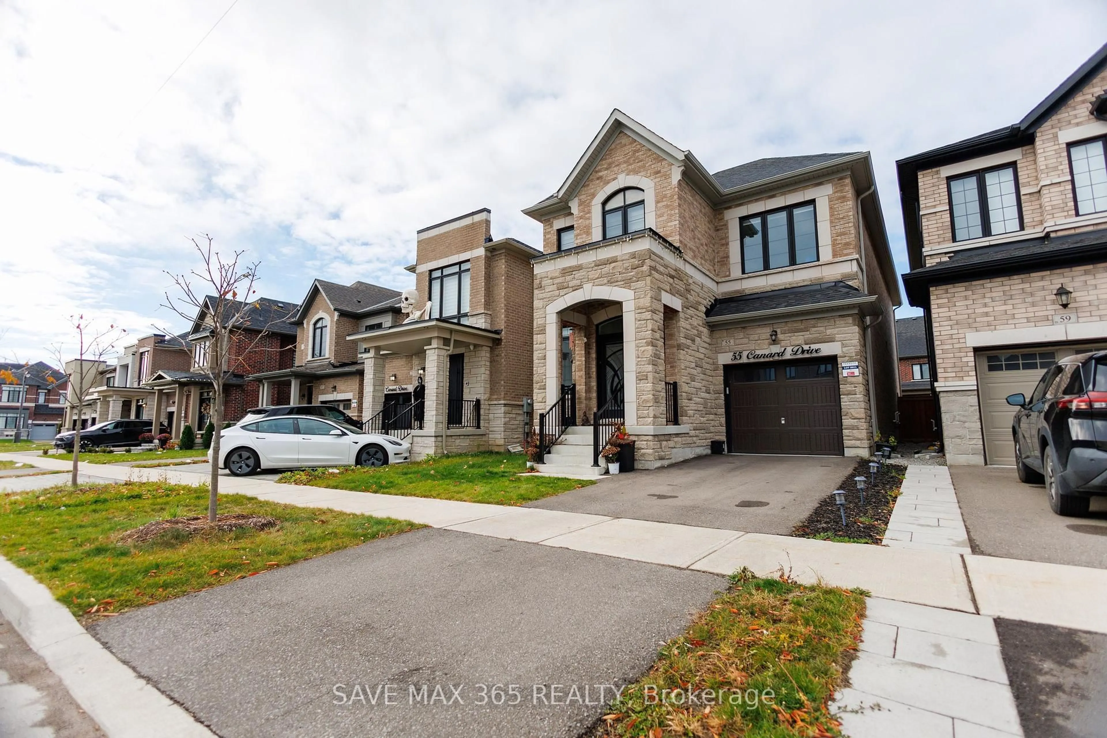Home with brick exterior material, street for 55 Canard Dr, Vaughan Ontario L4H 5C4