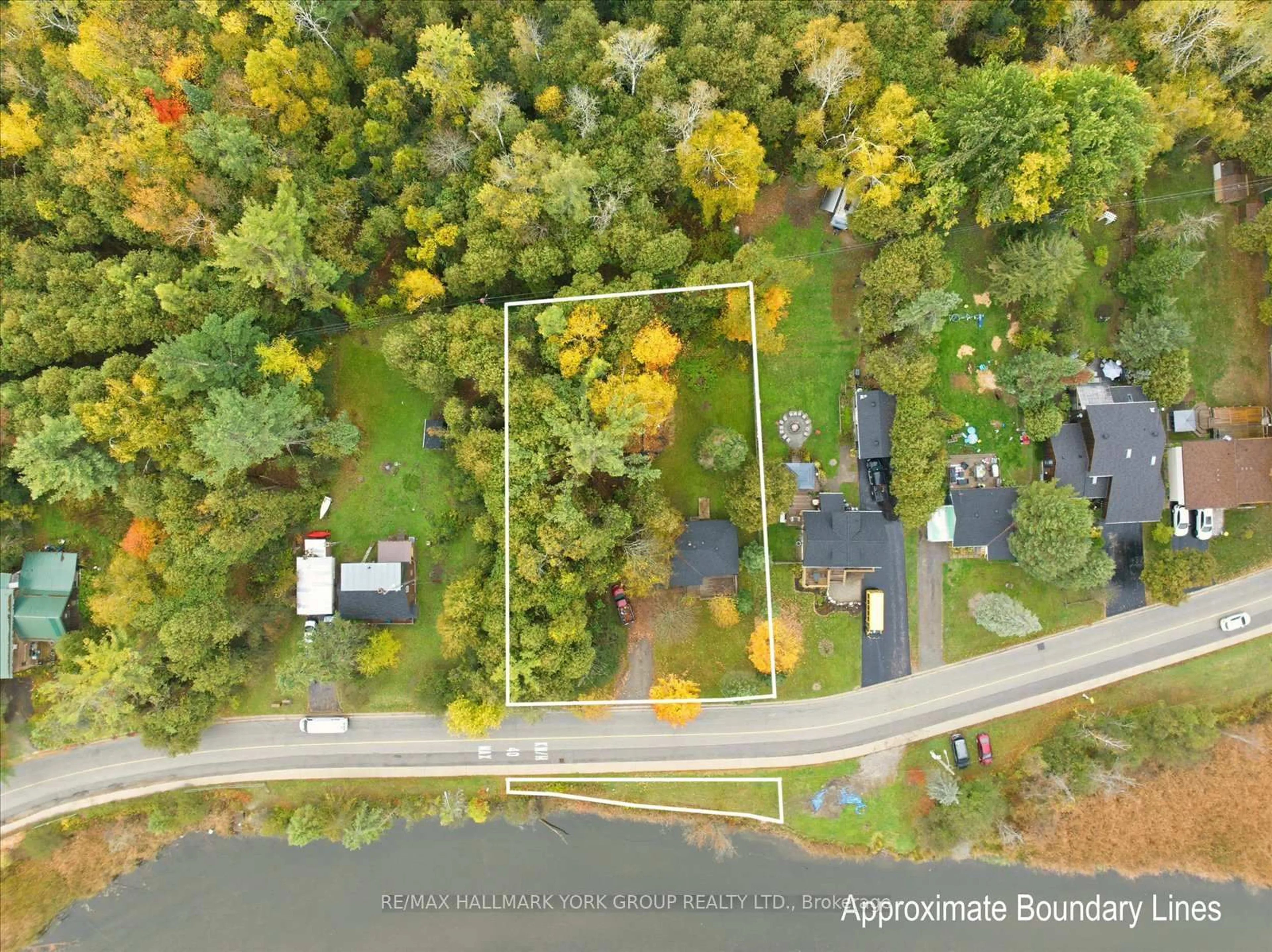 A pic from outside/outdoor area/front of a property/back of a property/a pic from drone, water/lake/river/ocean view for 32 Station Rd, Georgina Ontario L0E 1N0