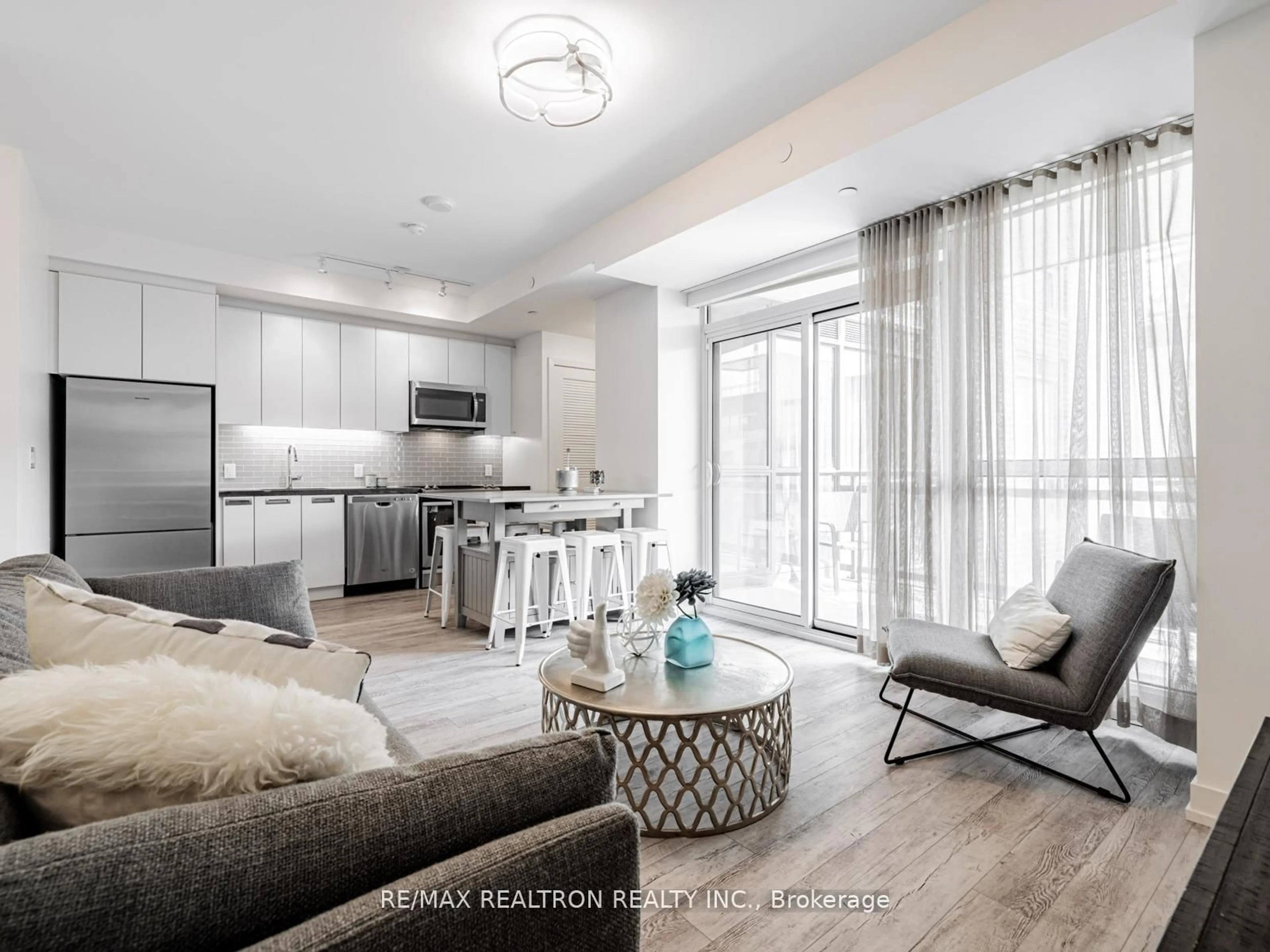 Living room with furniture, unknown for 271 Sea Ray Ave #B303, Innisfil Ontario L9S 0J4