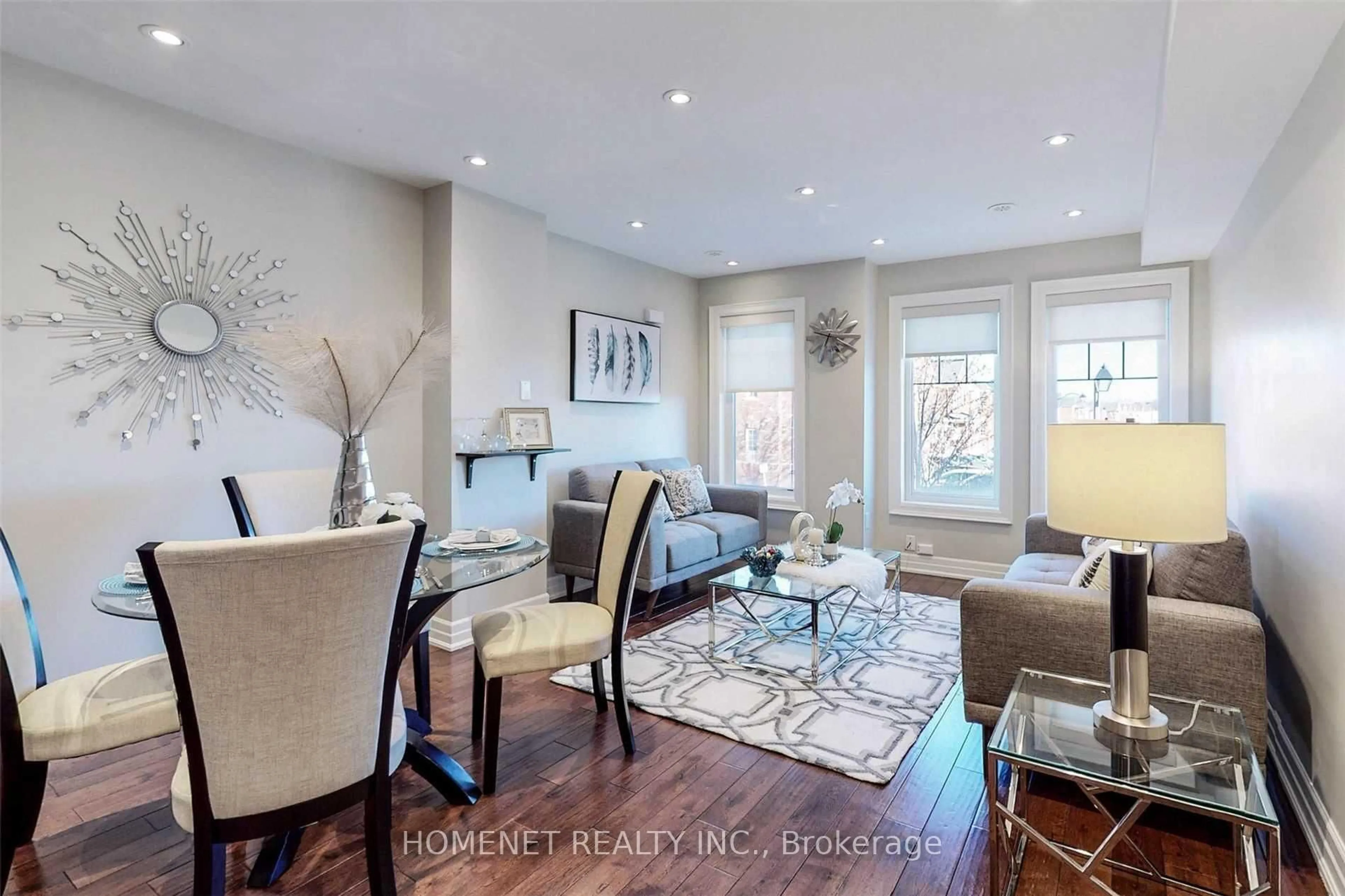 Living room with furniture, wood/laminate floor for 14 Truchard Ave, Markham Ontario L6C 0N3