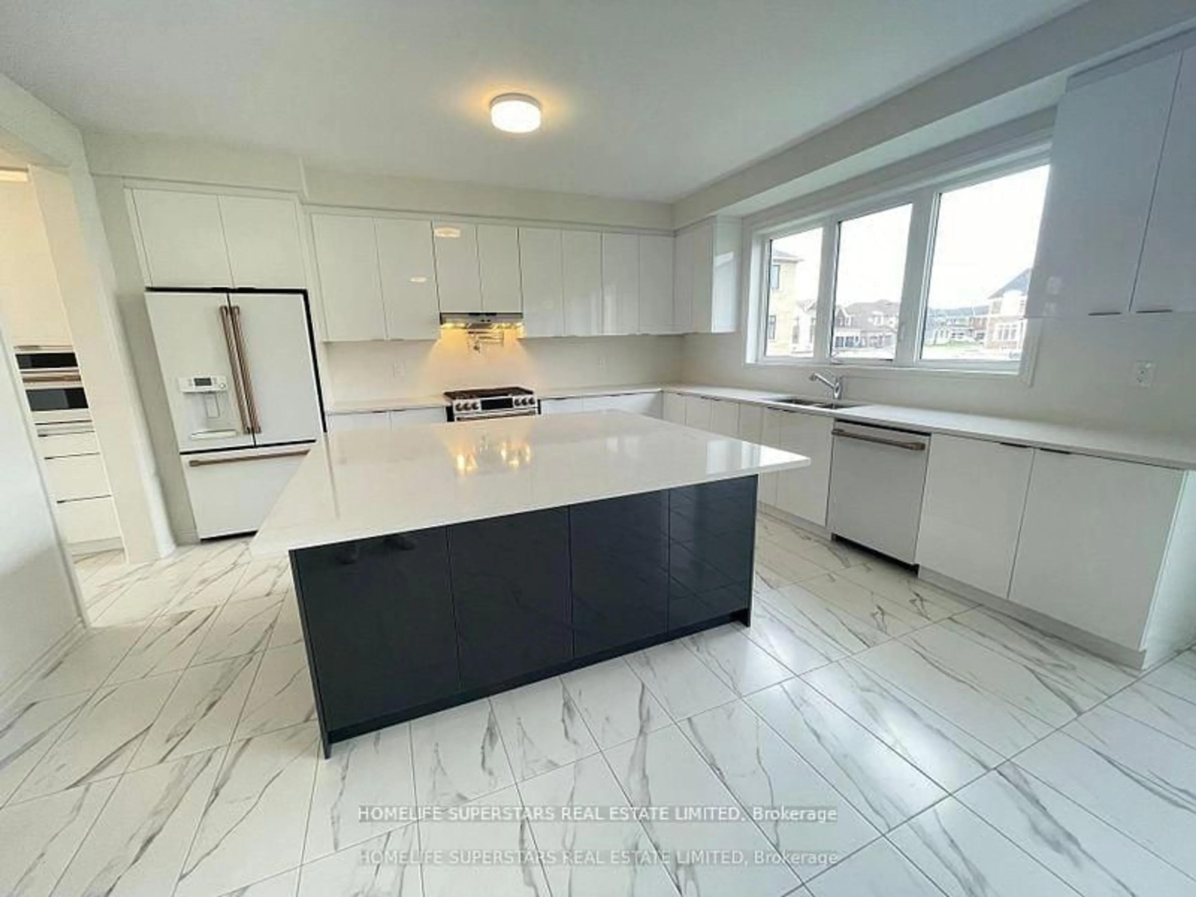 Open concept kitchen, ceramic/tile floor for 17 Bellflower Cres, Adjala-Tosorontio Ontario L0G 1W0