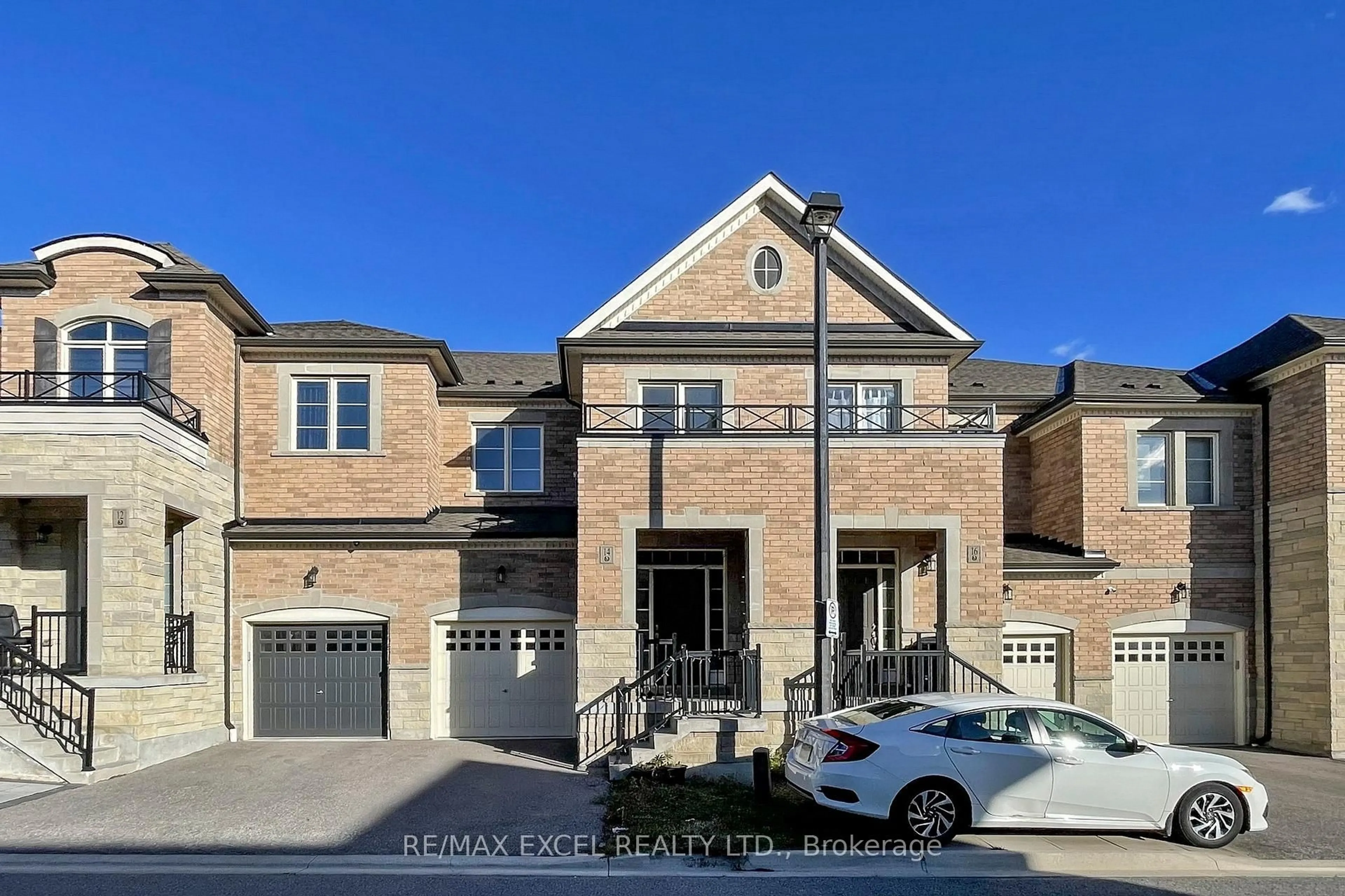 Home with brick exterior material, street for 14 TWINFLOWER Lane, Richmond Hill Ontario L4E 1E7