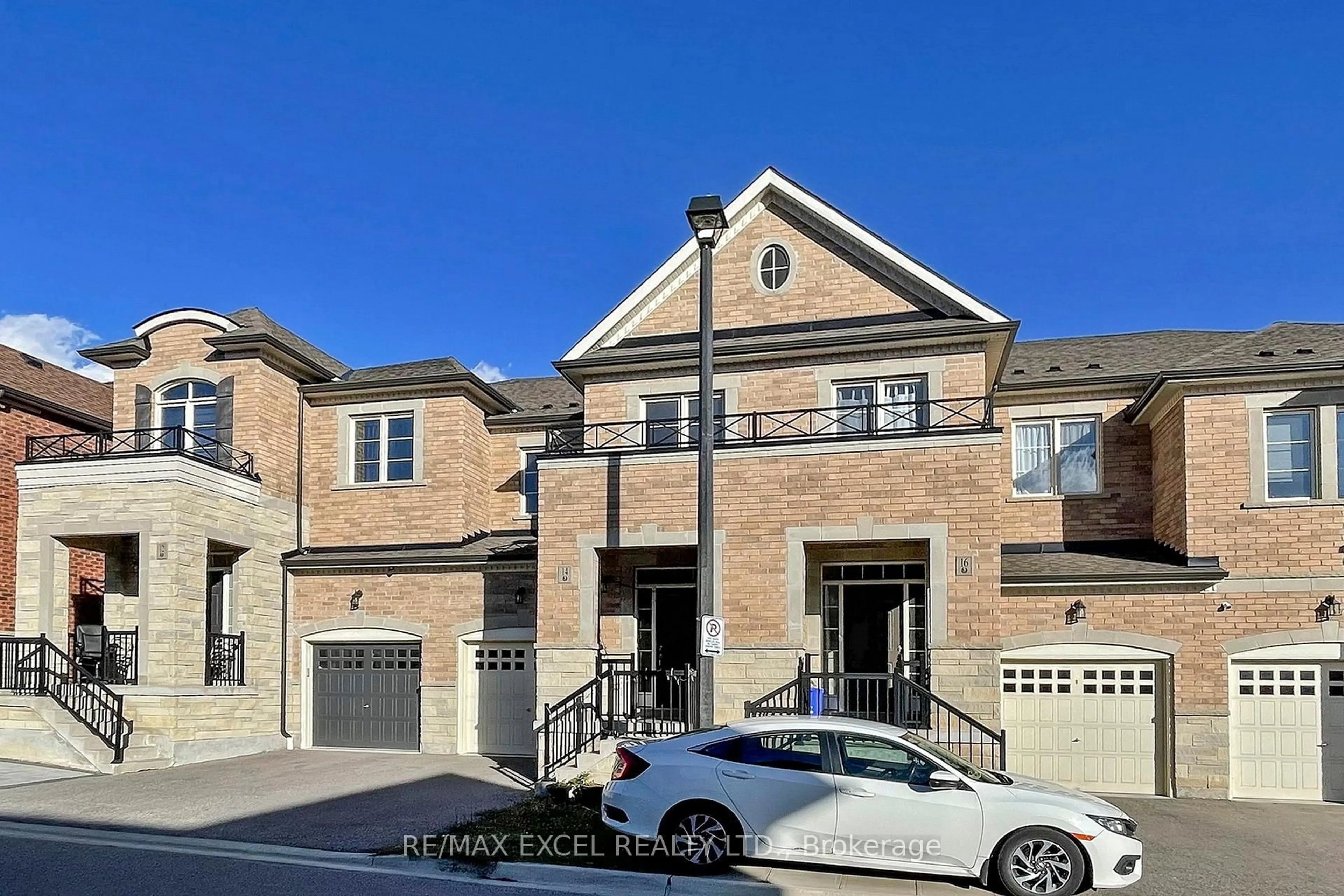 Home with brick exterior material, street for 14 TWINFLOWER Lane, Richmond Hill Ontario L4E 1E7