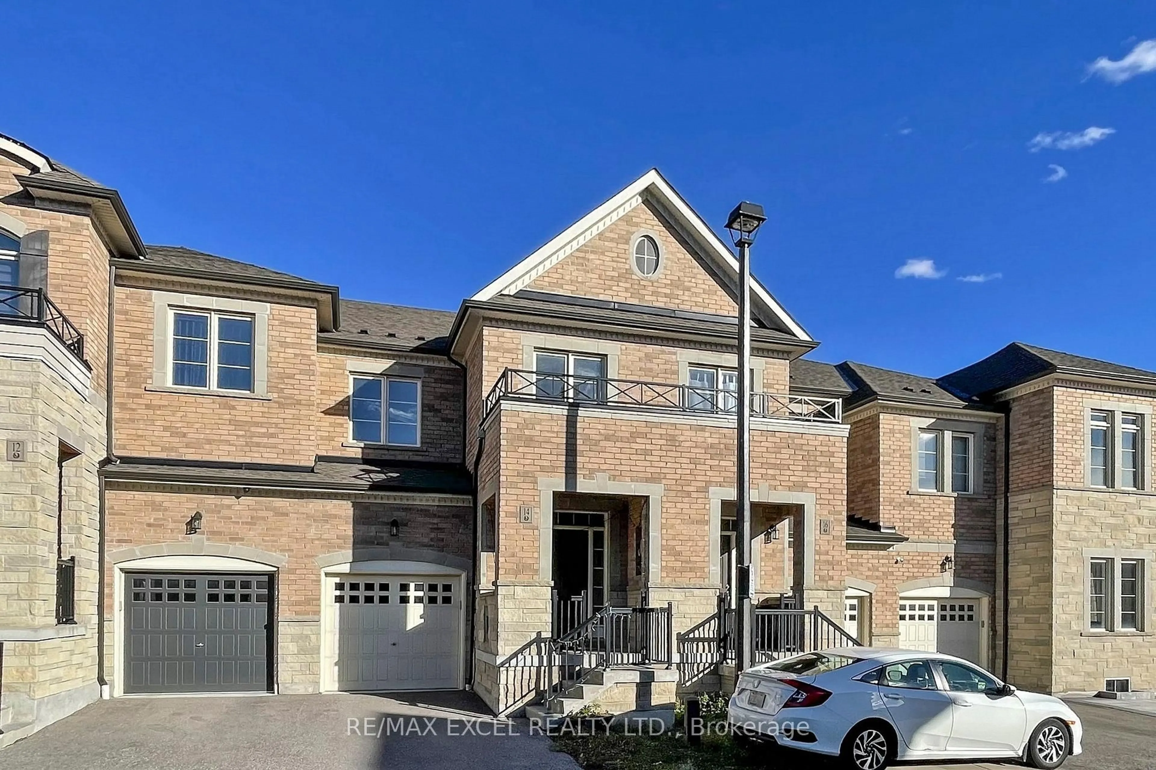 Home with brick exterior material, street for 14 TWINFLOWER Lane, Richmond Hill Ontario L4E 1E7
