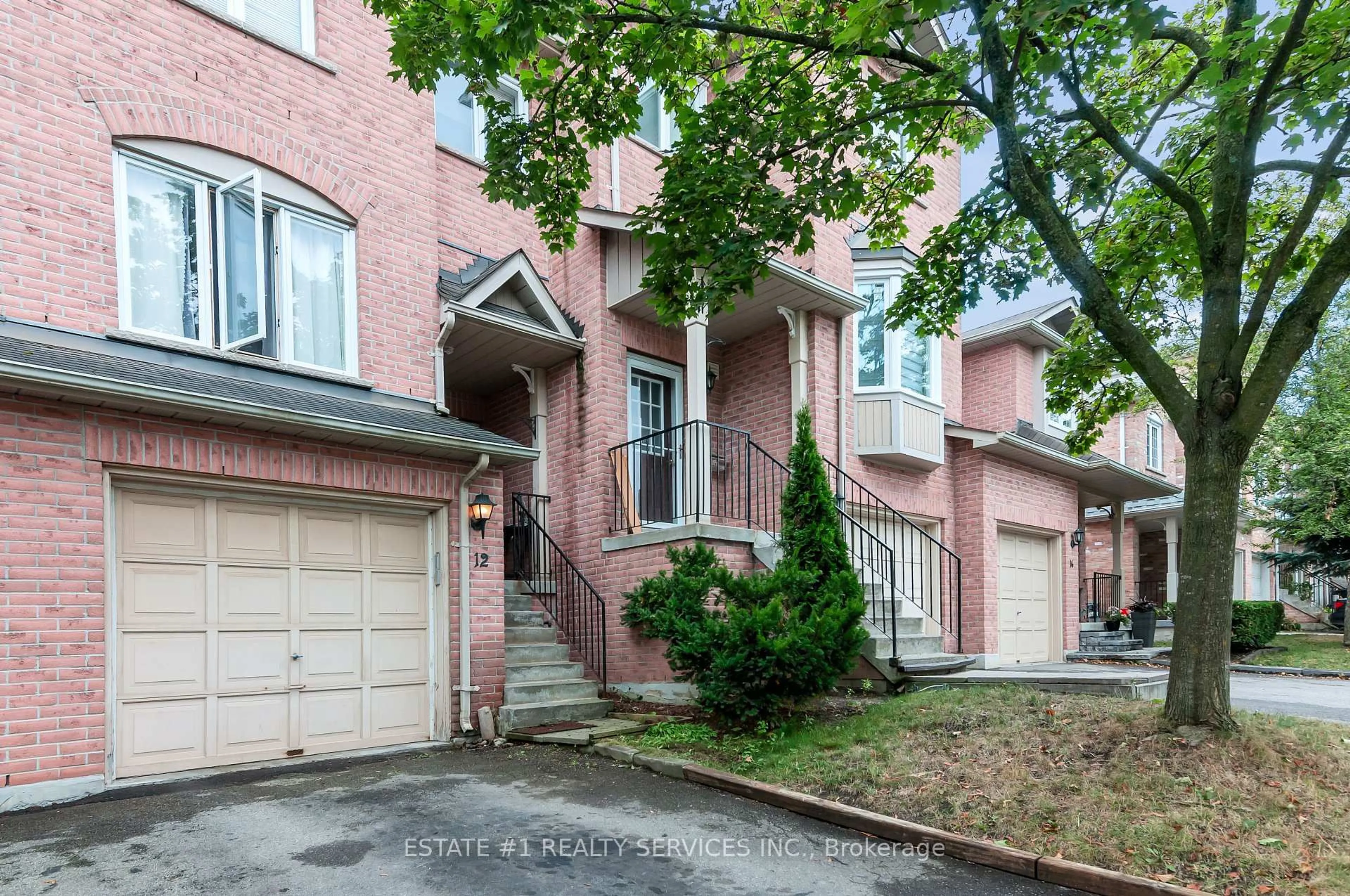 Home with brick exterior material, street for 12 Rougehaven Way, Markham Ontario L3P 7W5