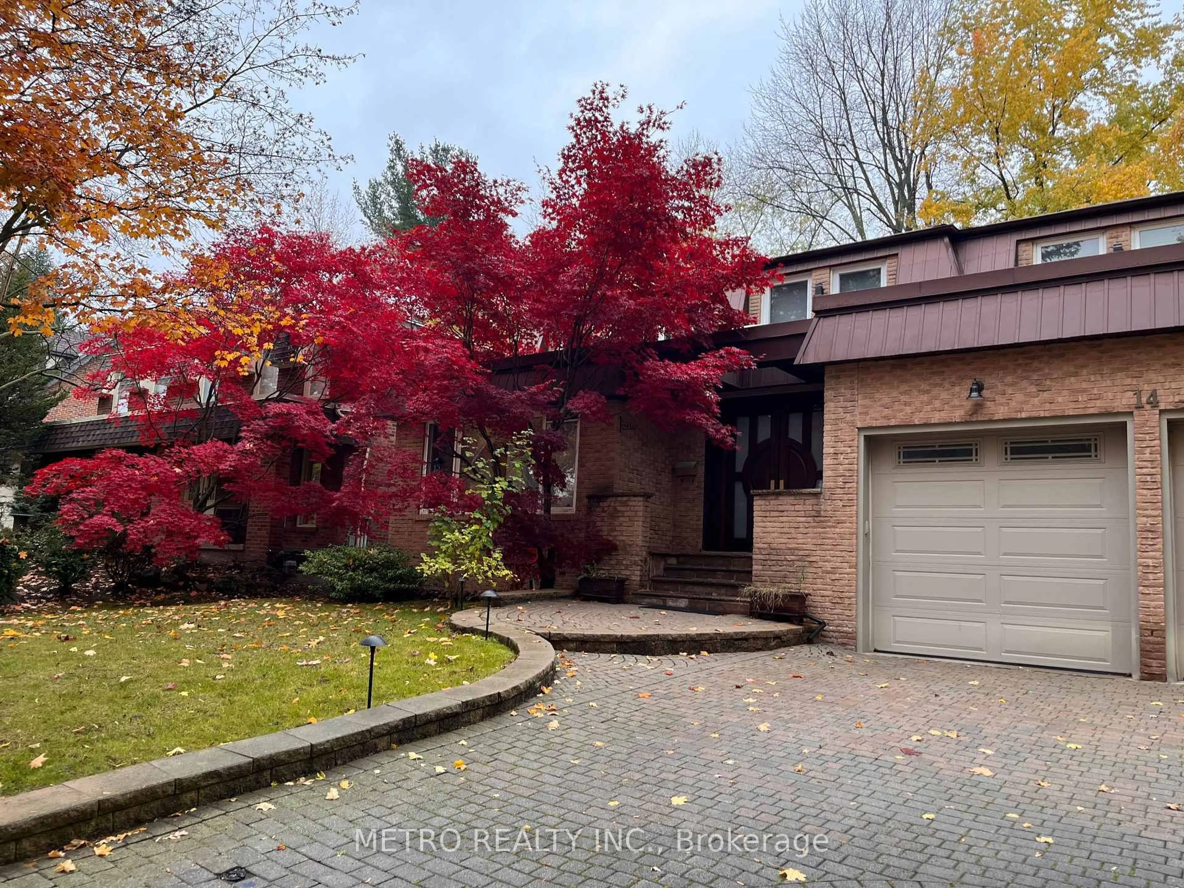 Home with brick exterior material, street for 14 Village Squire Lane, Markham Ontario L3T 1Z9
