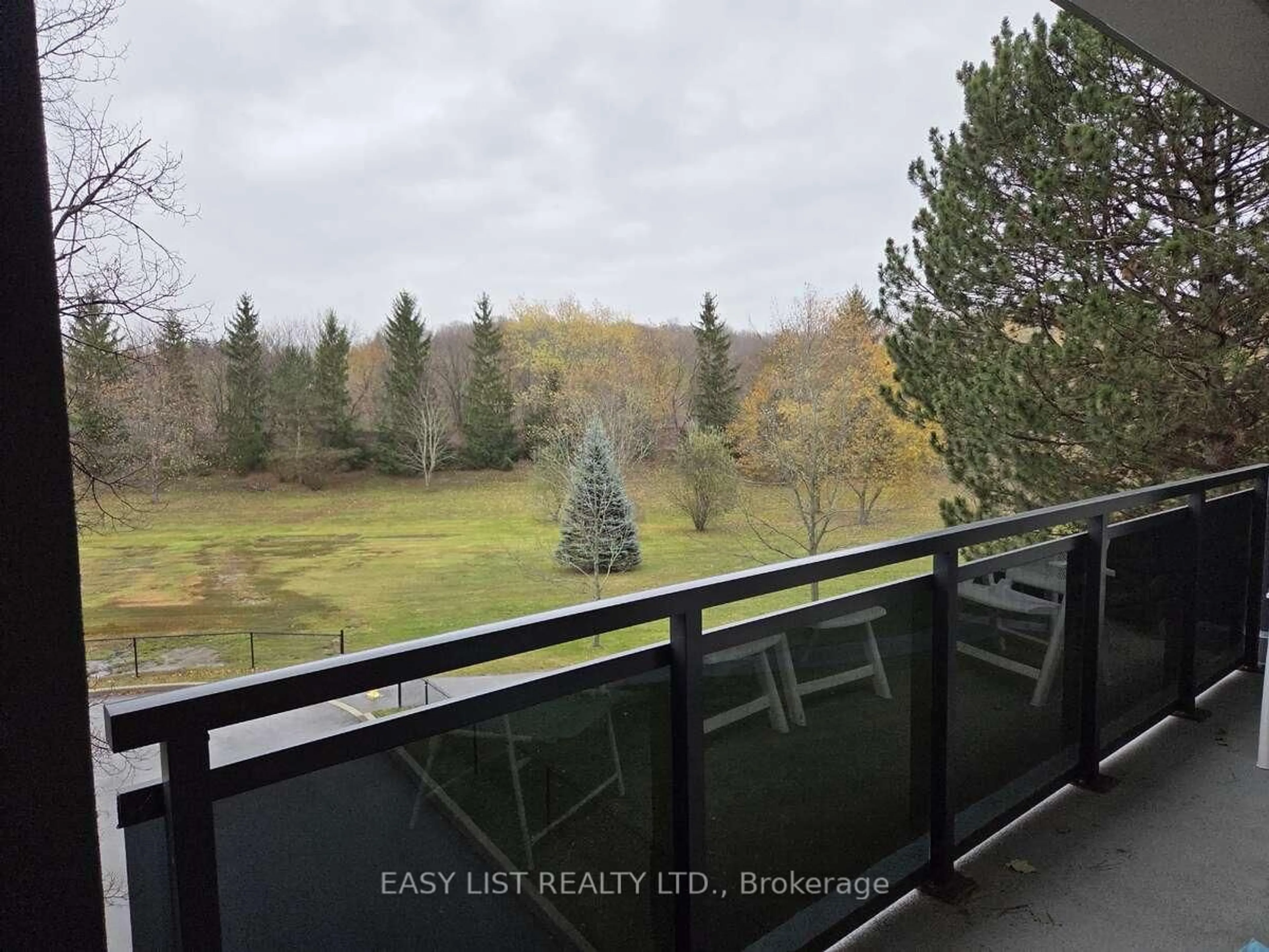 Balcony in the apartment, forest/trees view for 155 Main St #203, Newmarket Ontario L3Y 8C2