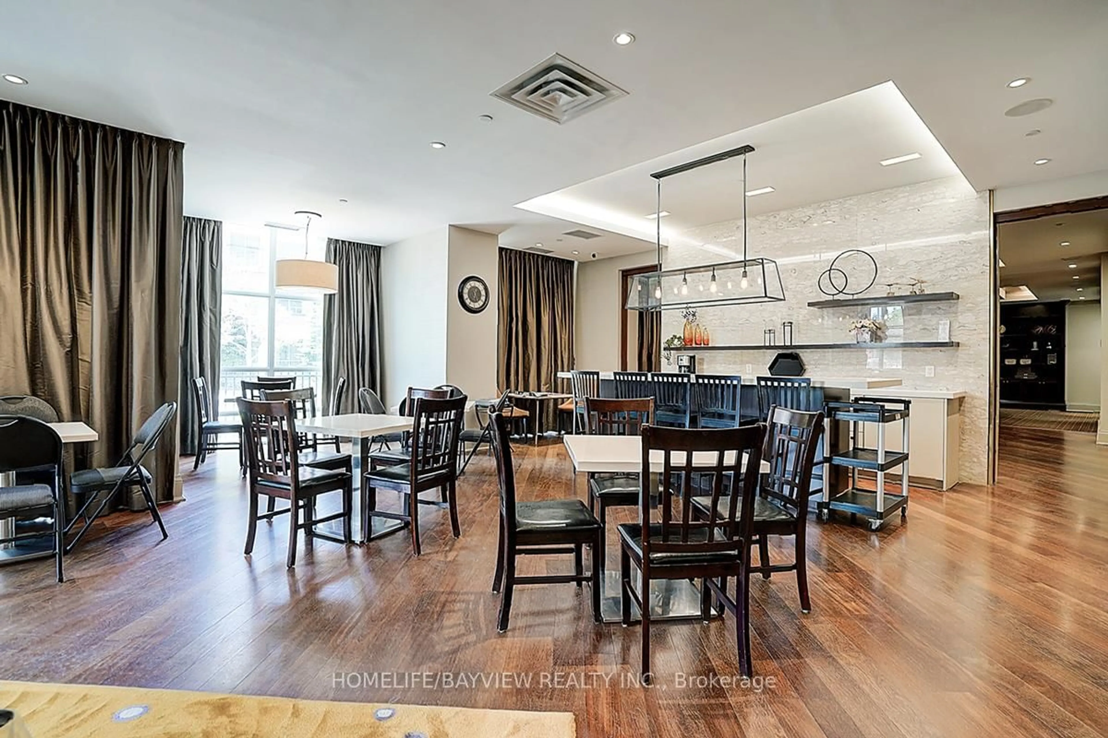 Dining room, wood/laminate floor for 111 Civic Square Gate #216, Aurora Ontario L4G 0S6