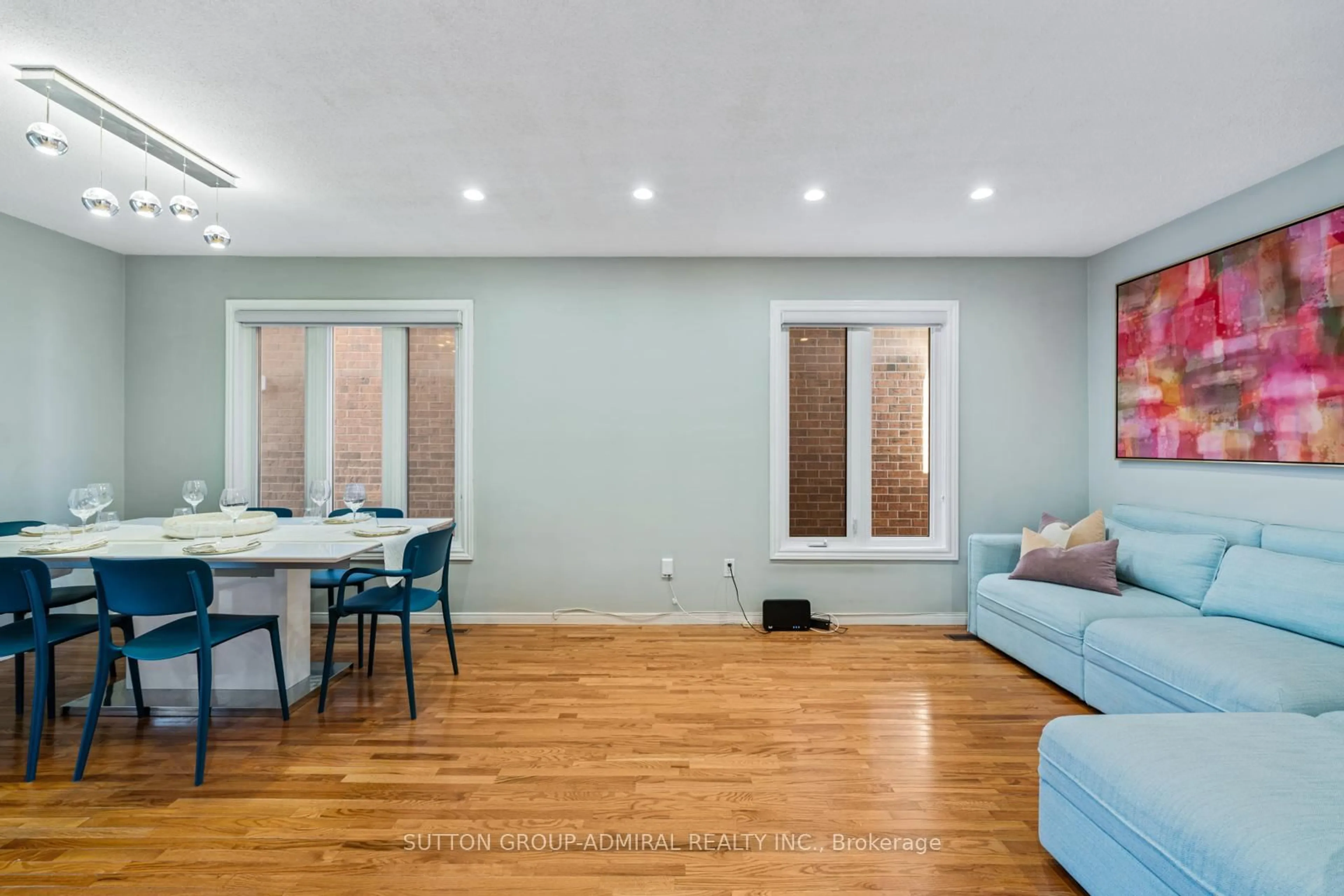 Living room with furniture, wood/laminate floor for 109 Whitney Pl, Vaughan Ontario L4J 6V6