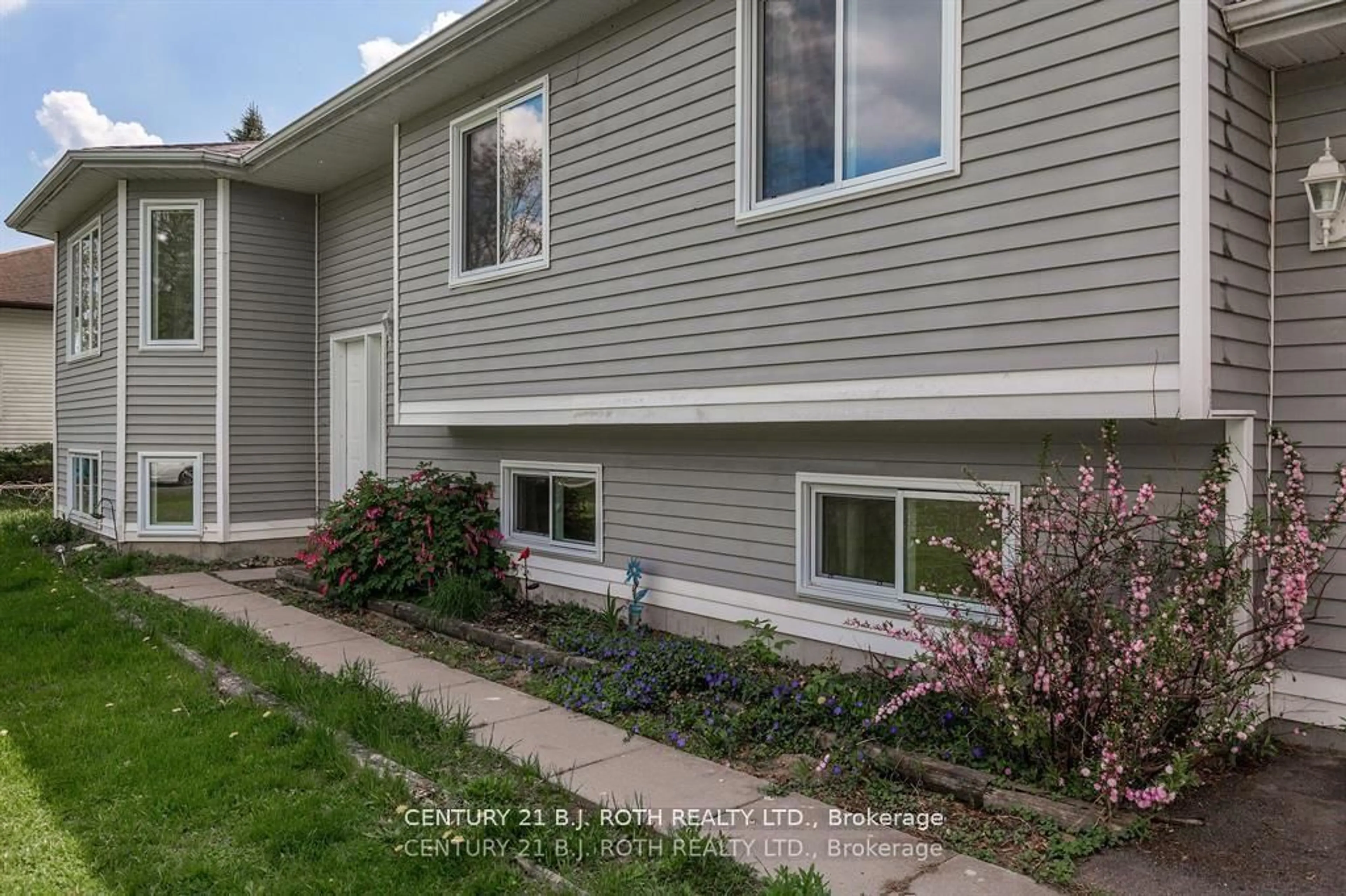 Home with vinyl exterior material, street for 7972 County 13 Rd, Adjala-Tosorontio Ontario L0M 1M0