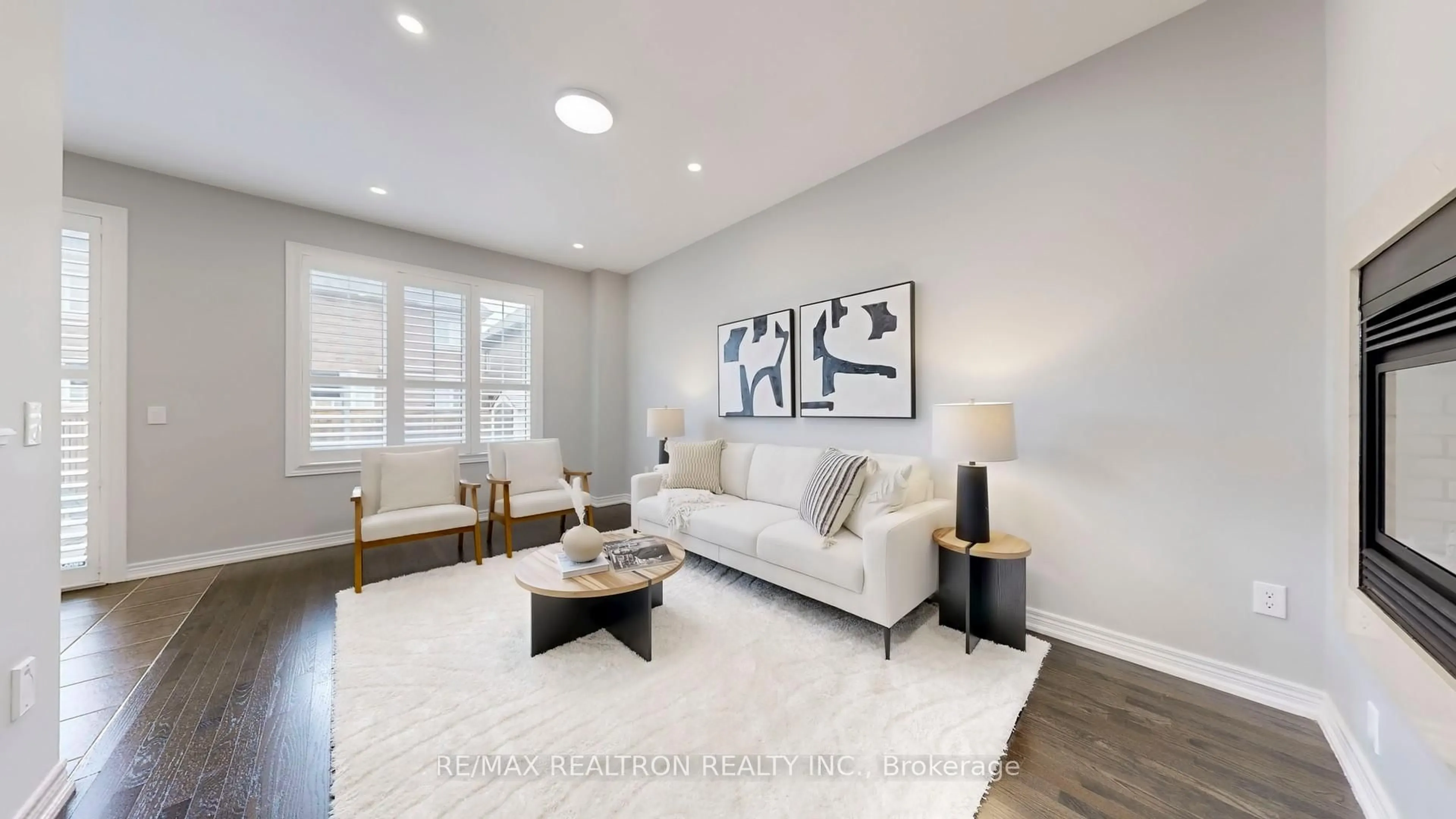 Living room with furniture, wood/laminate floor for 88 Memon Pl, Markham Ontario L6E 0S3