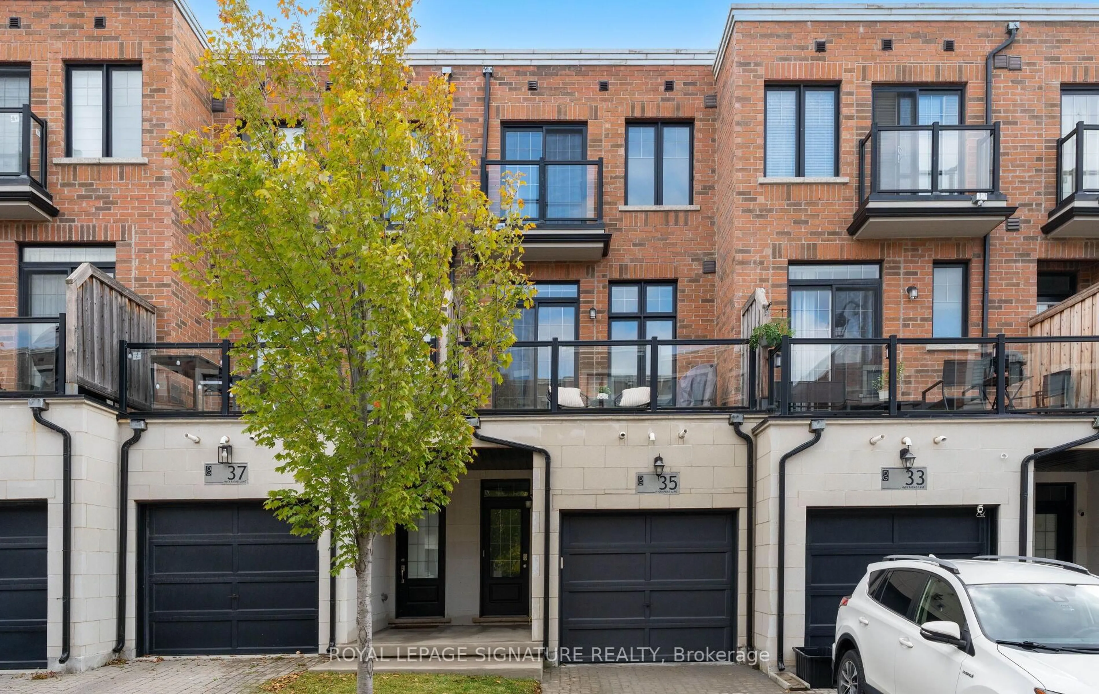 Home with brick exterior material, street for 35 Hyderabad Lane, Markham Ontario L6E 0T8