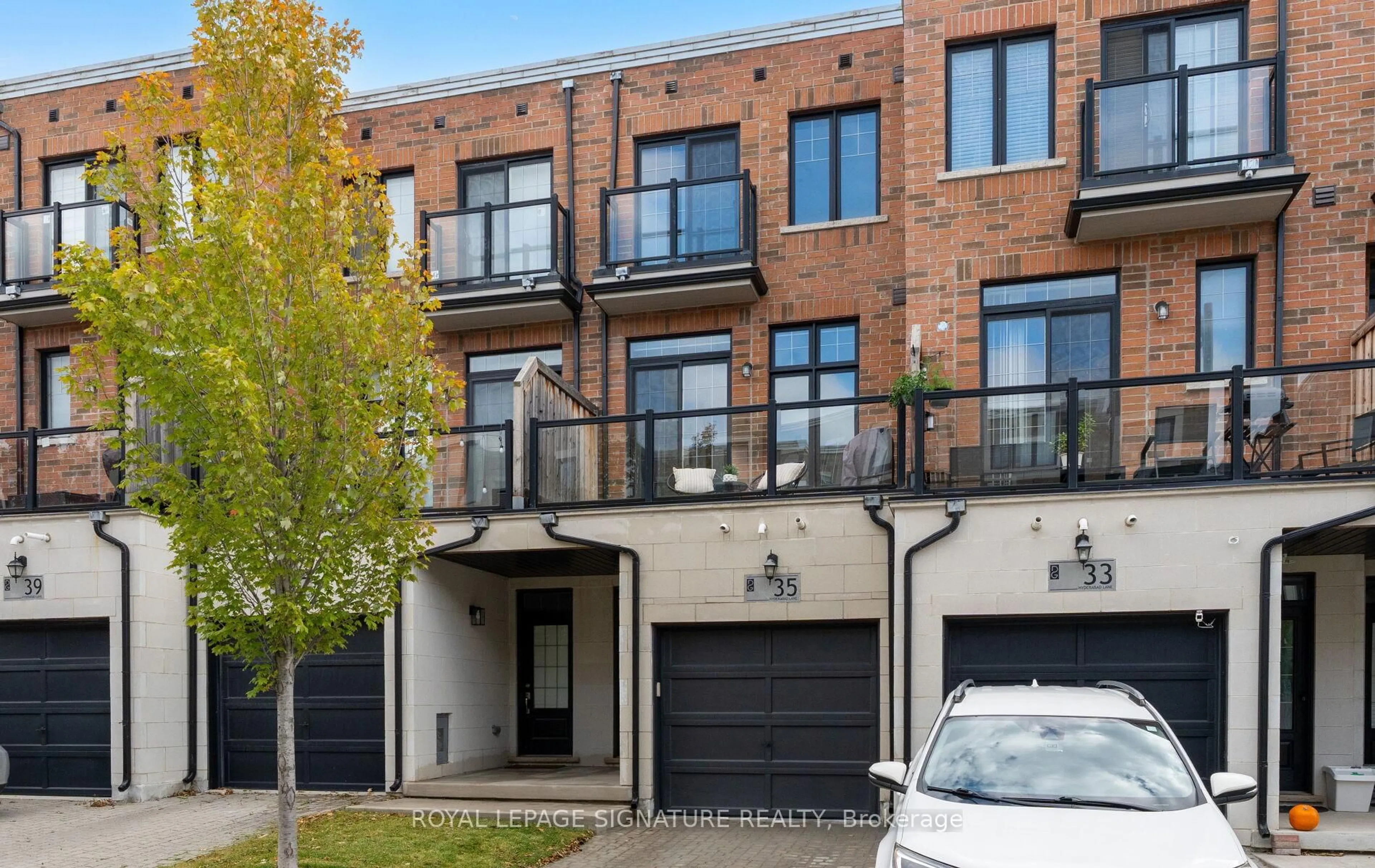 Home with brick exterior material, street for 35 Hyderabad Lane, Markham Ontario L6E 0T8