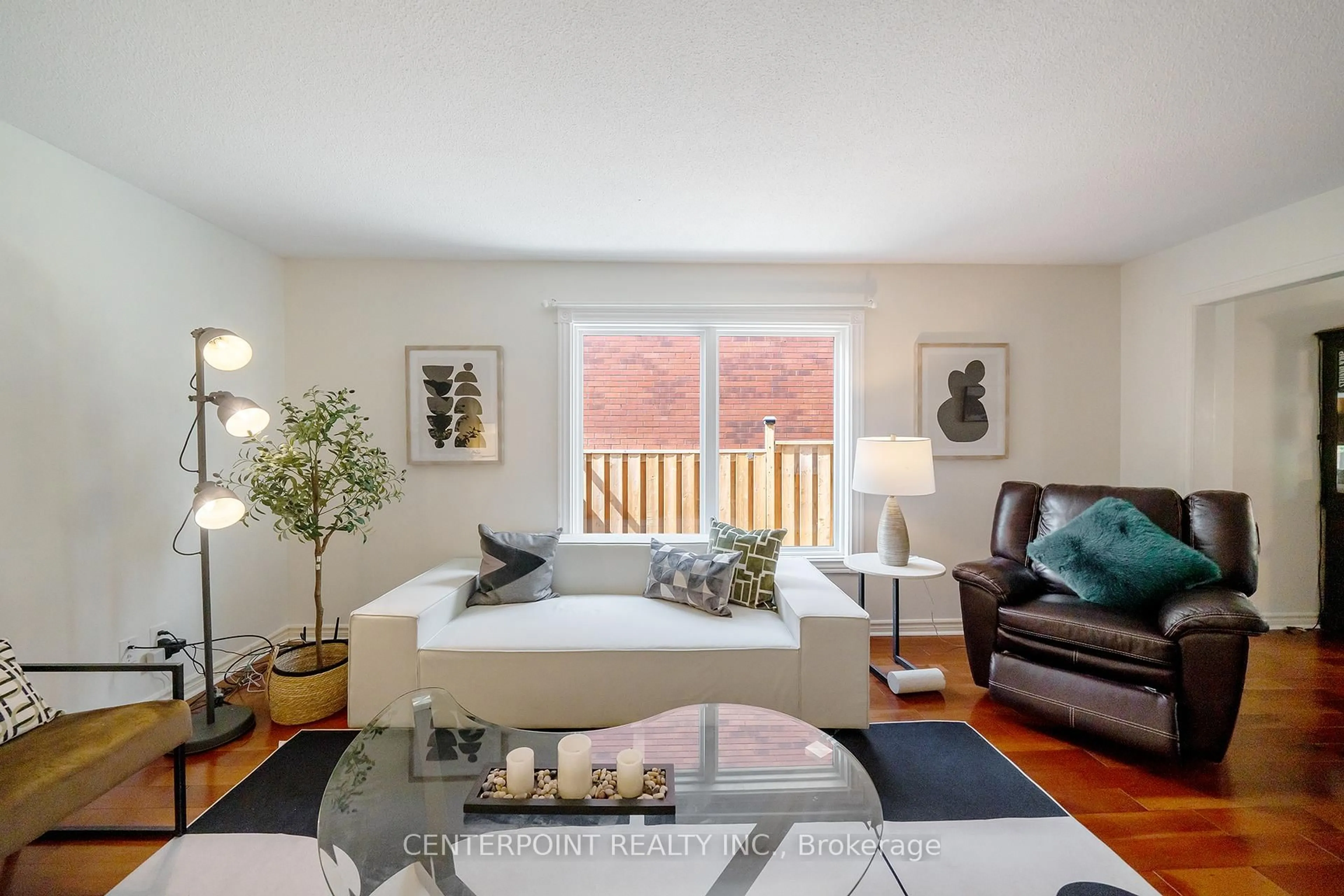 Living room with furniture, wood/laminate floor for 8 Woodlawn Rd, Markham Ontario L3P 7G4