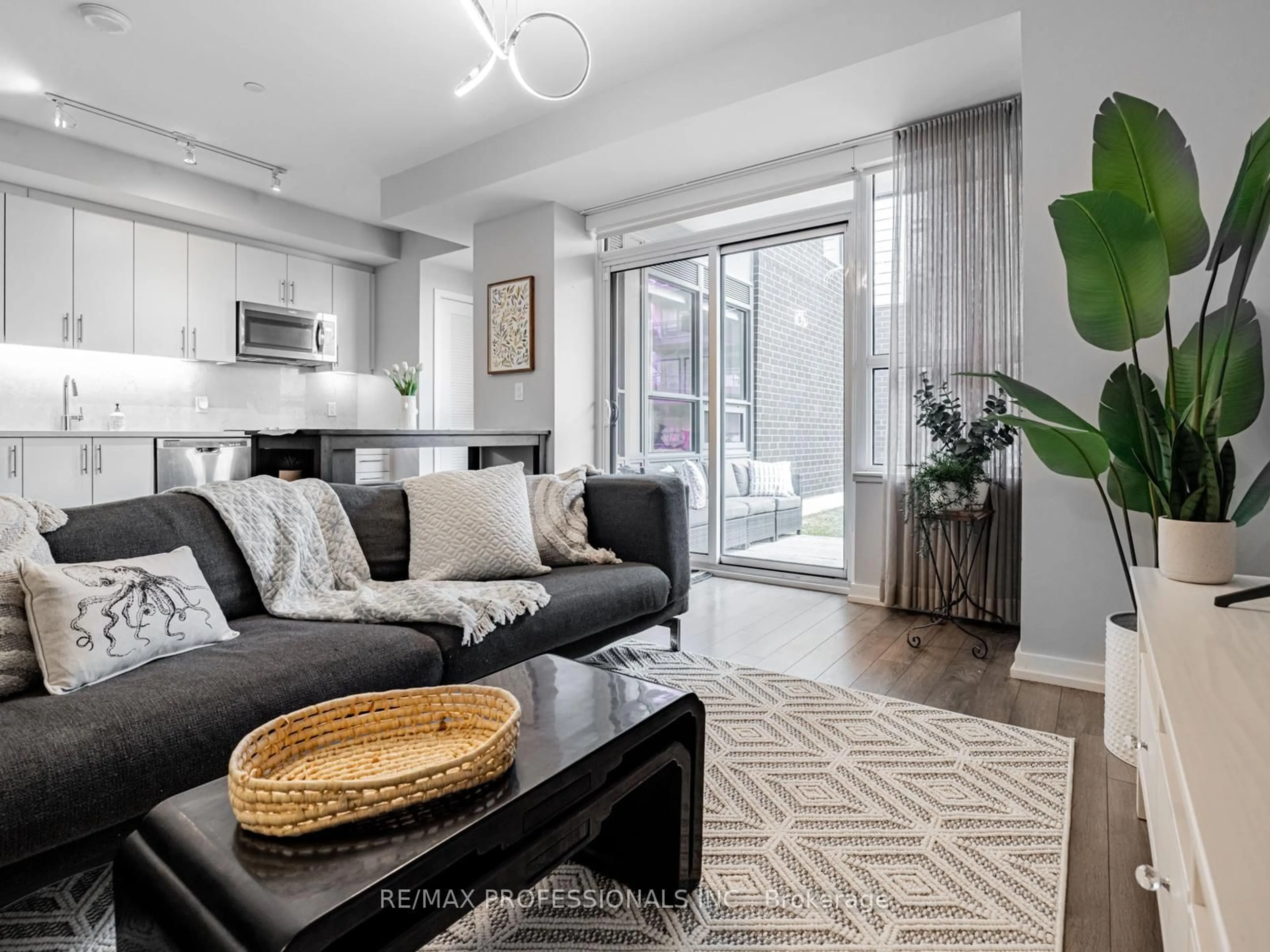 Living room with furniture, unknown for 241 Sea Ray Ave #A101, Innisfil Ontario L9S 0L9