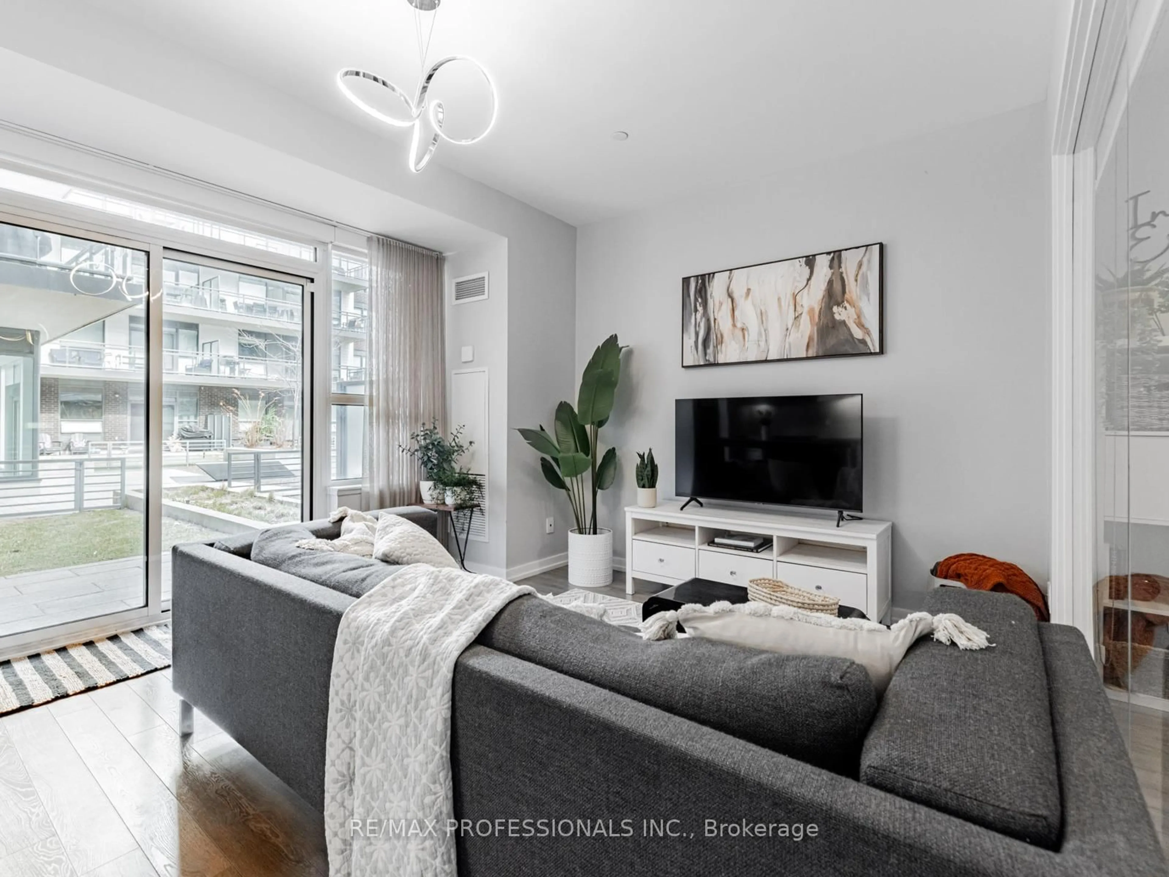 Living room with furniture, unknown for 241 Sea Ray Ave #A101, Innisfil Ontario L9S 0L9