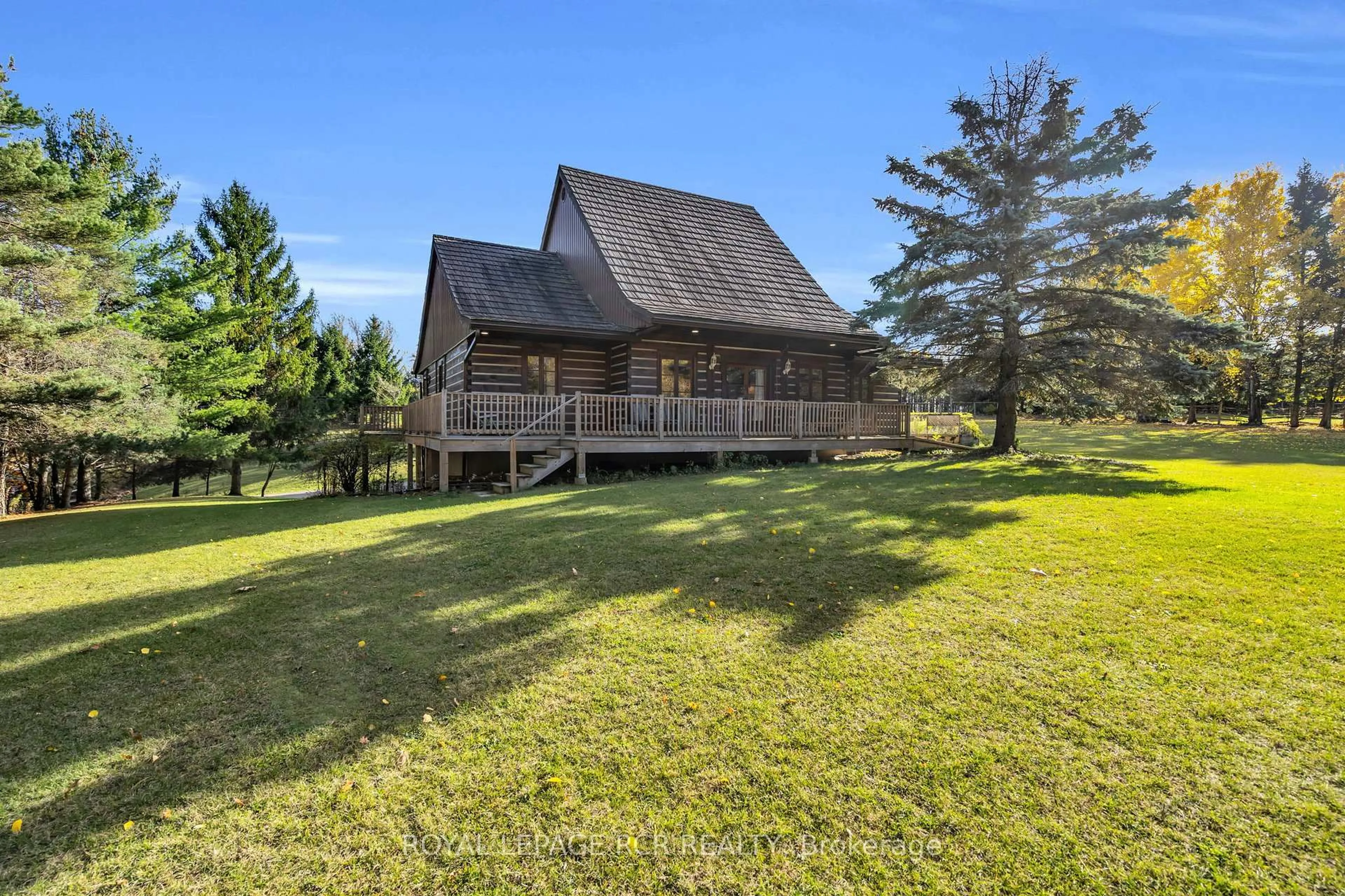 A pic from outside/outdoor area/front of a property/back of a property/a pic from drone, water/lake/river/ocean view for 300 Old Bathurst St, King Ontario L7B 1K5