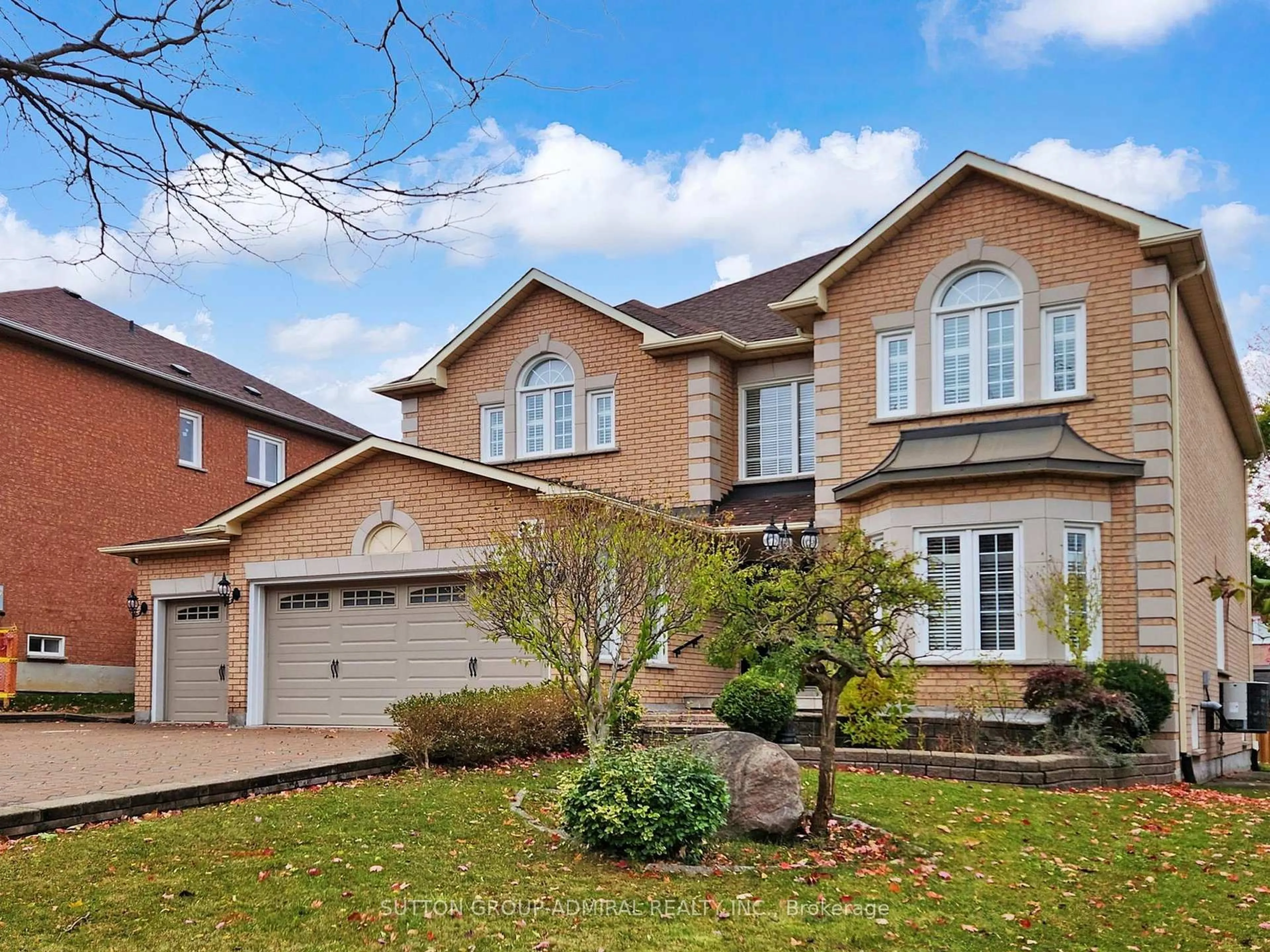 Home with brick exterior material, street for 94 Reansbury Cres, Markham Ontario L6C 1X6