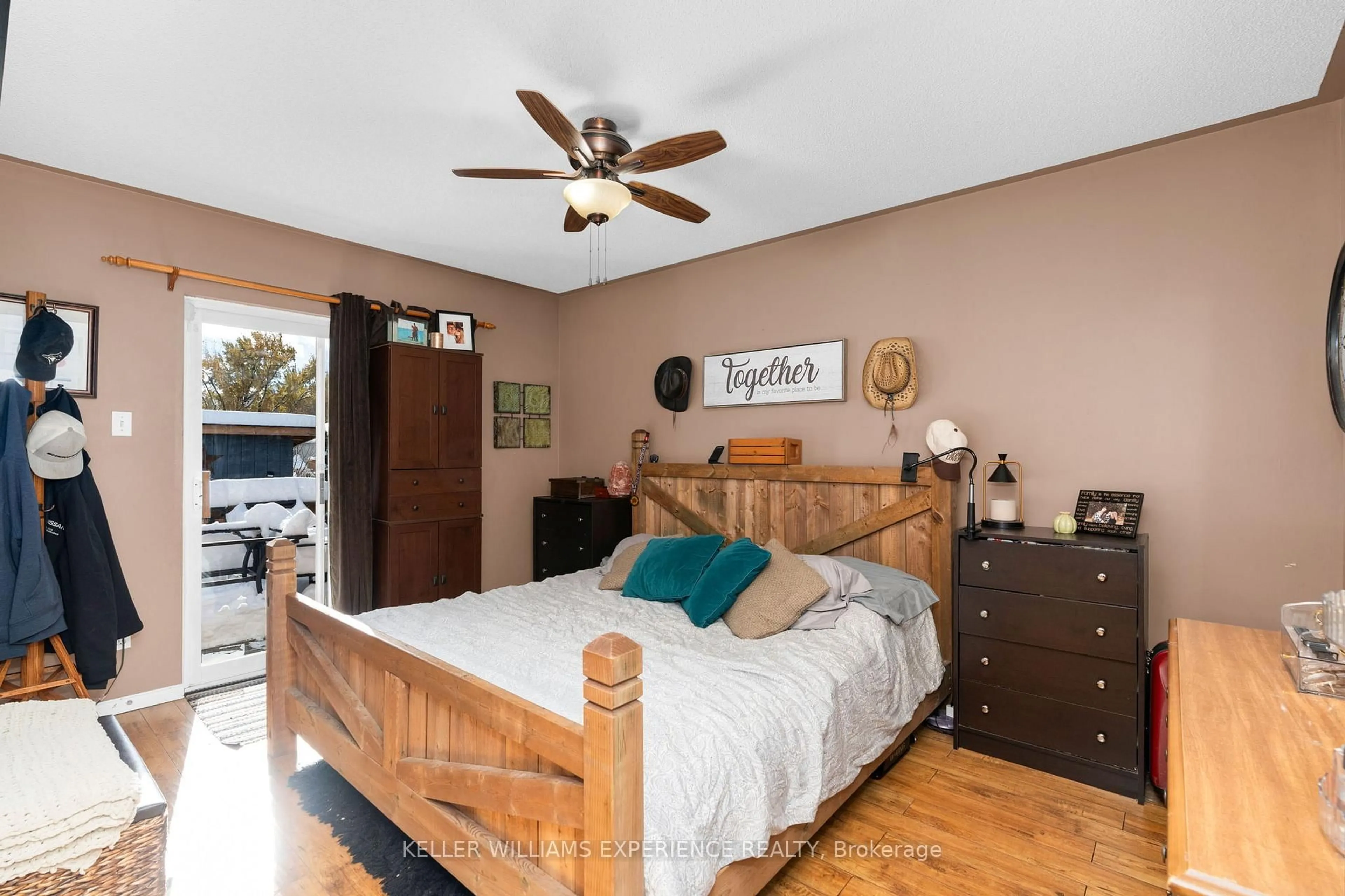 Bedroom with bed, wood/laminate floor for 13 Kate Aitken Cres, New Tecumseth Ontario L0G 1A0