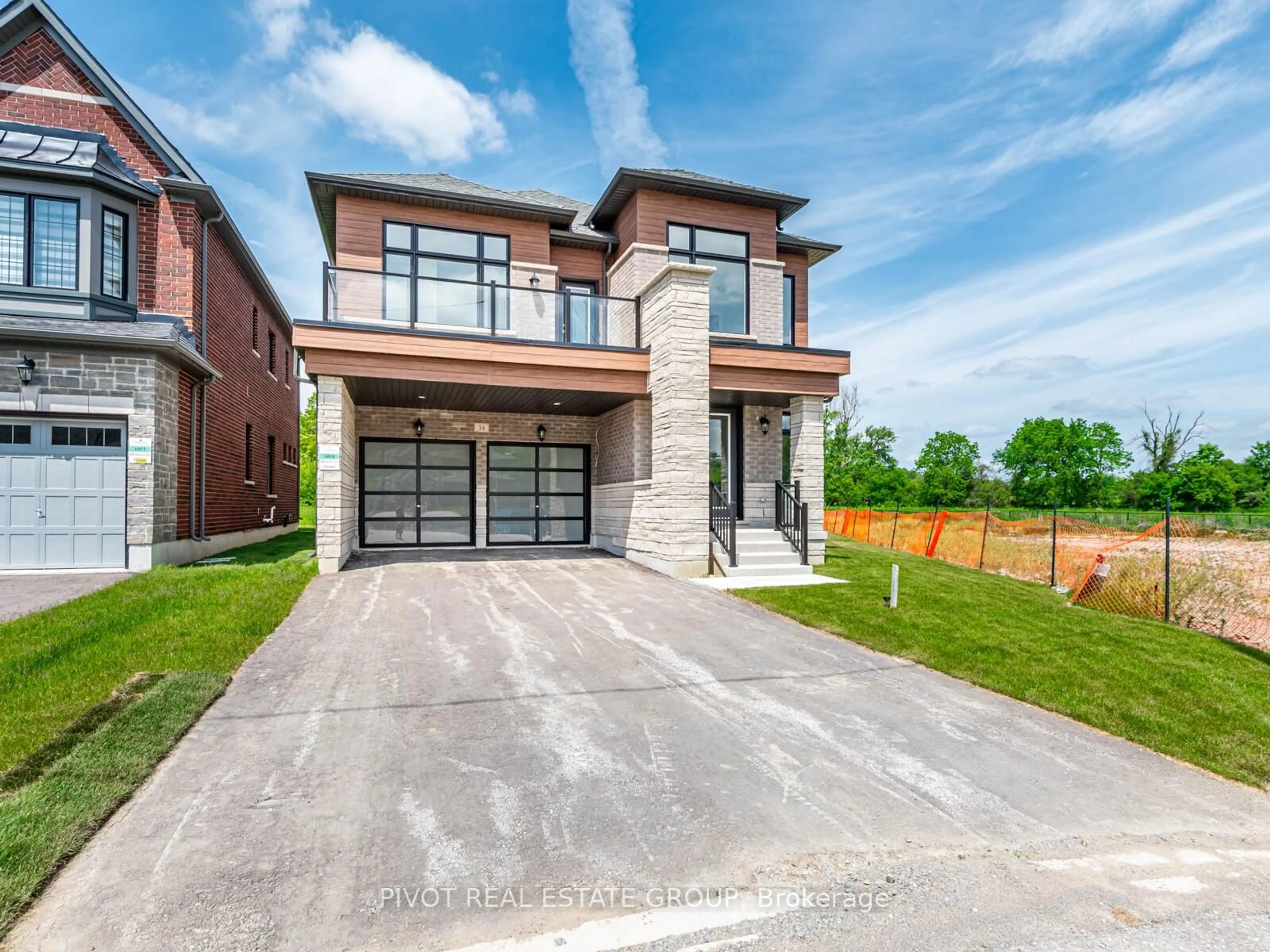 Home with brick exterior material, street for 34 Montorio Dr, Richmond Hill Ontario L4E 1N4