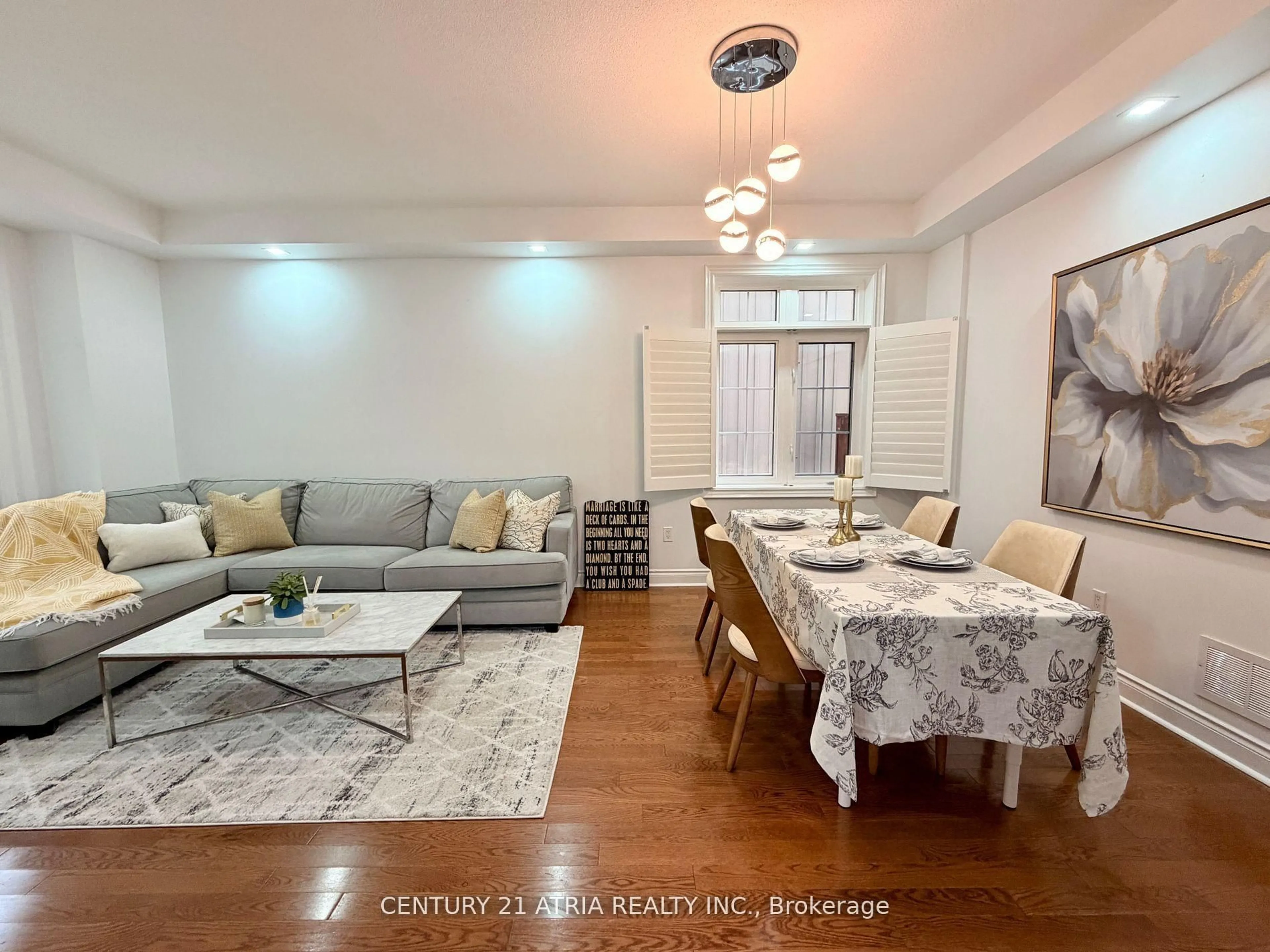 Living room with furniture, wood/laminate floor for 14 West Normandy Dr, Markham Ontario L6B 0A8