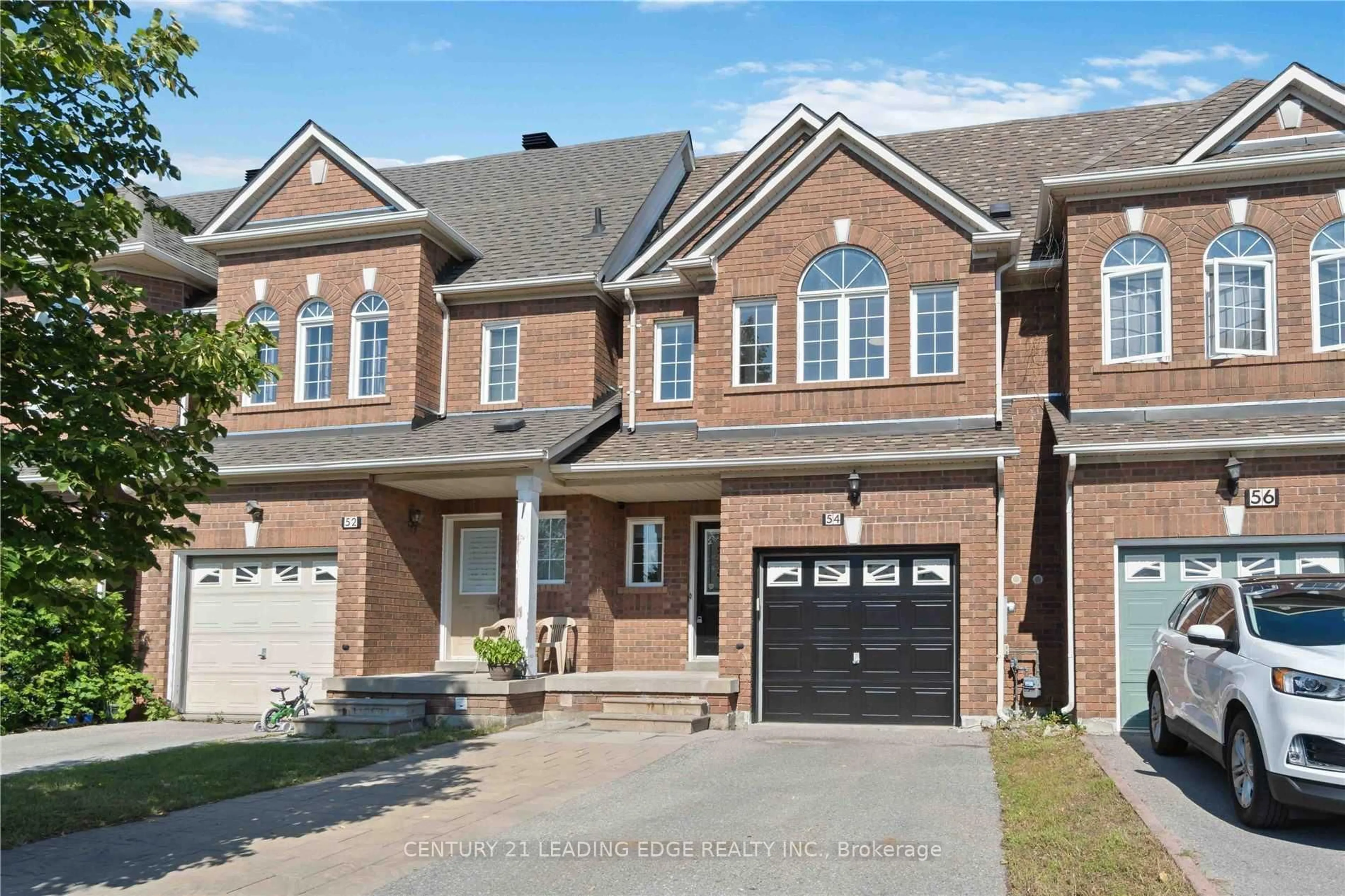 Home with brick exterior material, street for 54 REDKEY Dr, Markham Ontario L3S 4R4
