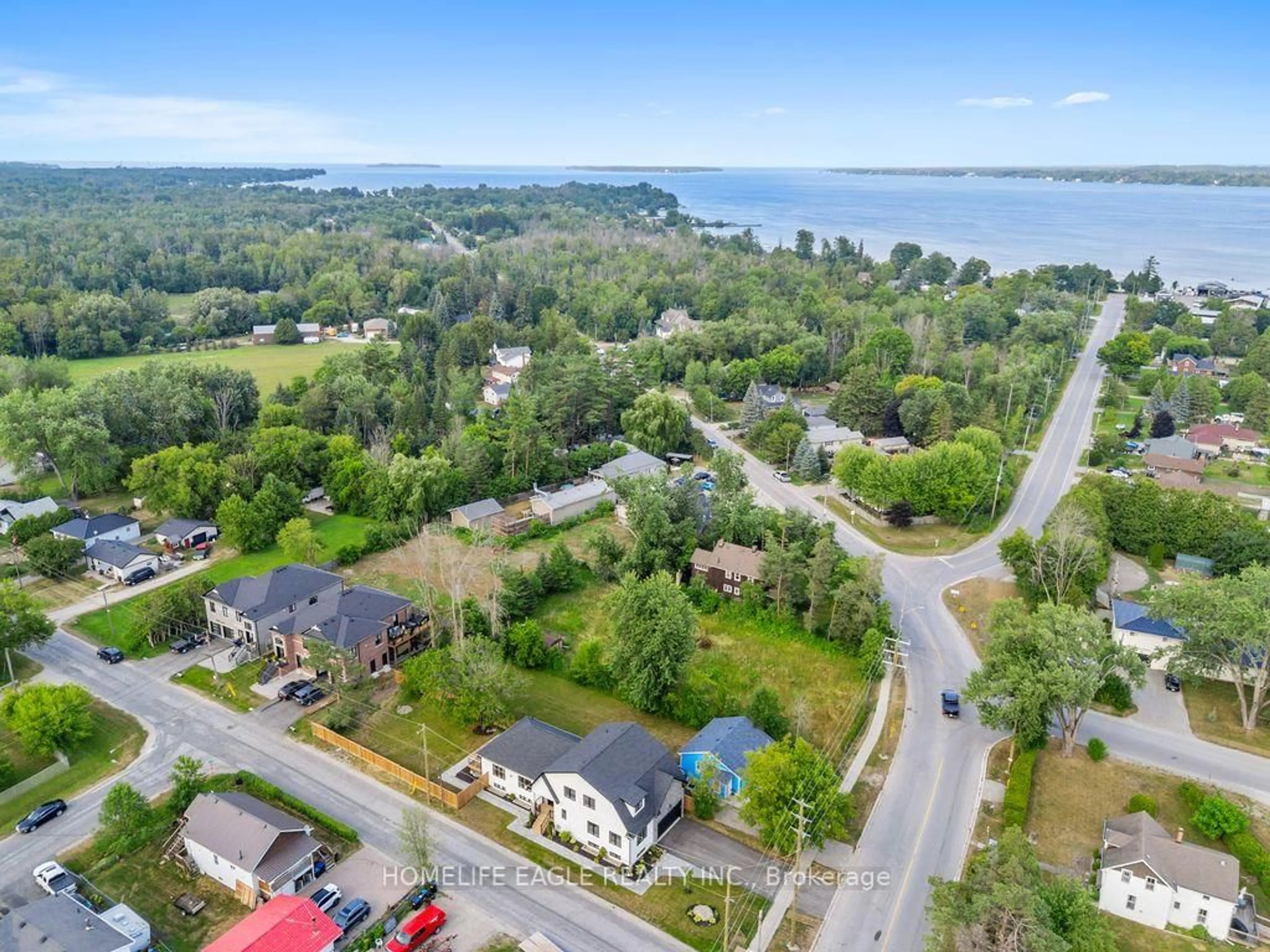 A pic from outside/outdoor area/front of a property/back of a property/a pic from drone, water/lake/river/ocean view for 1242 Killarney Beach Rd, Innisfil Ontario L0L 1W0