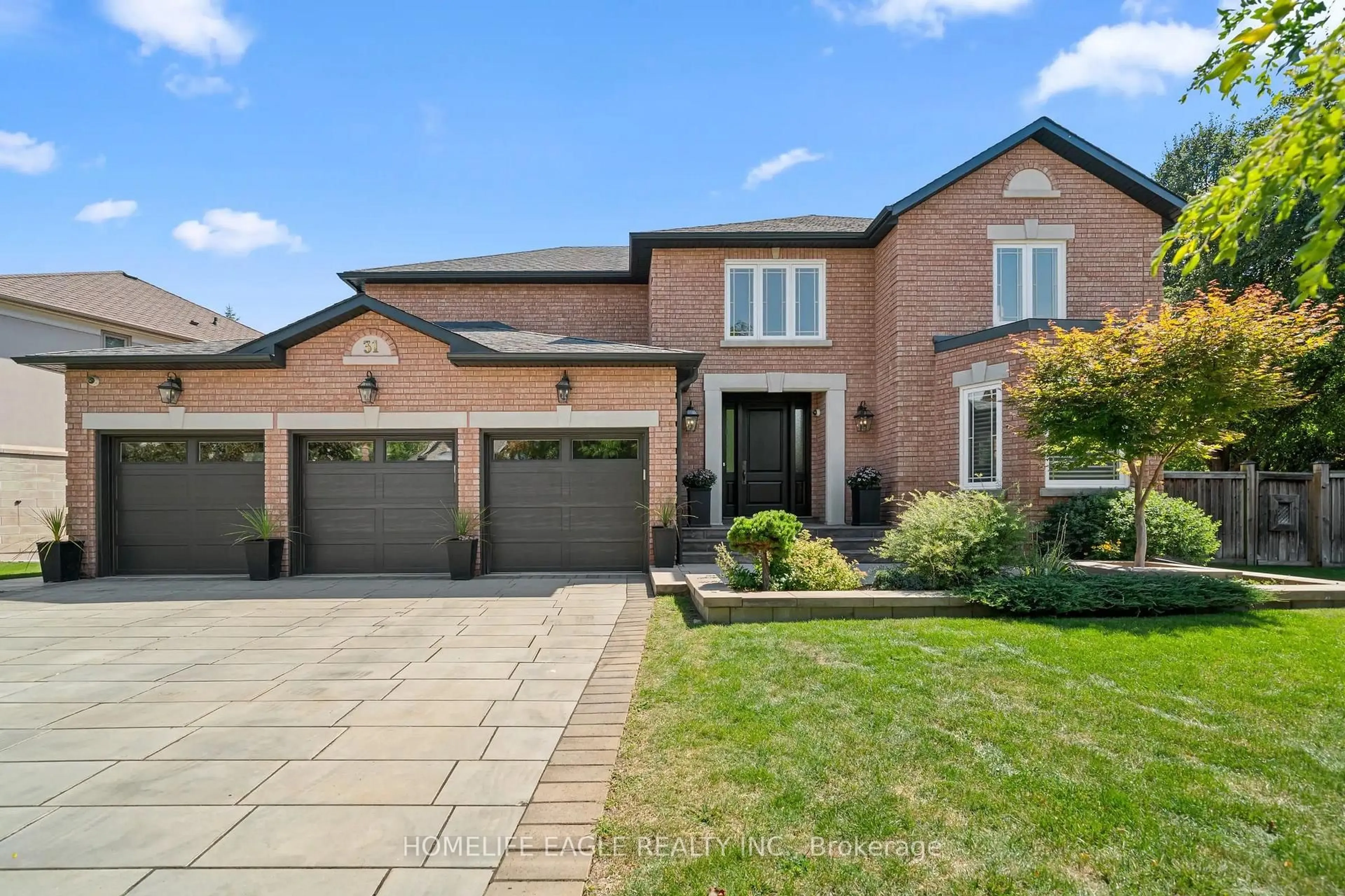 Home with brick exterior material, street for 31 Modesto Gdns, Vaughan Ontario L4L 8C9