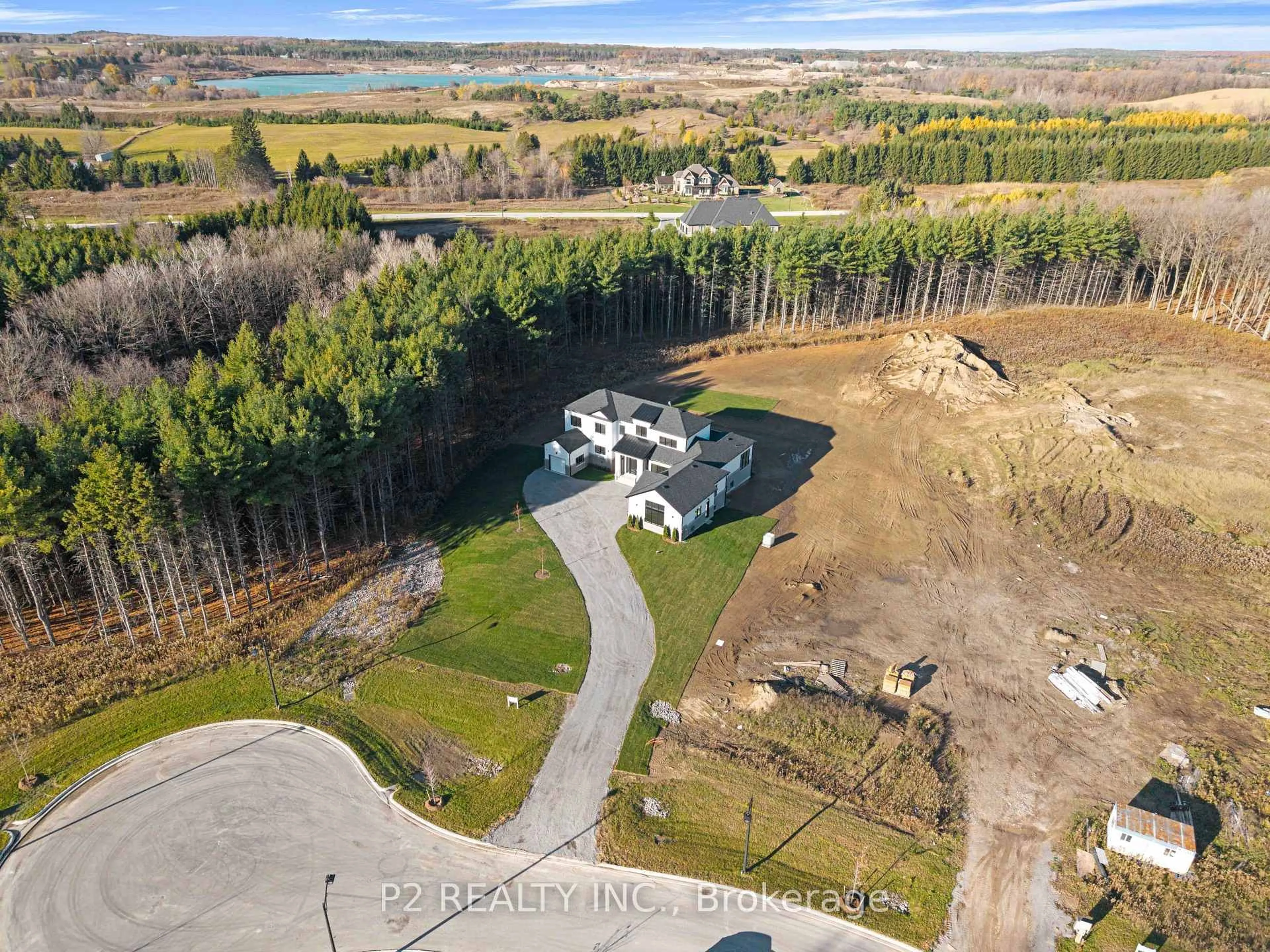 A pic from outside/outdoor area/front of a property/back of a property/a pic from drone, water/lake/river/ocean view for 50 Newton Reed Cres, Uxbridge Ontario L9P 0R3