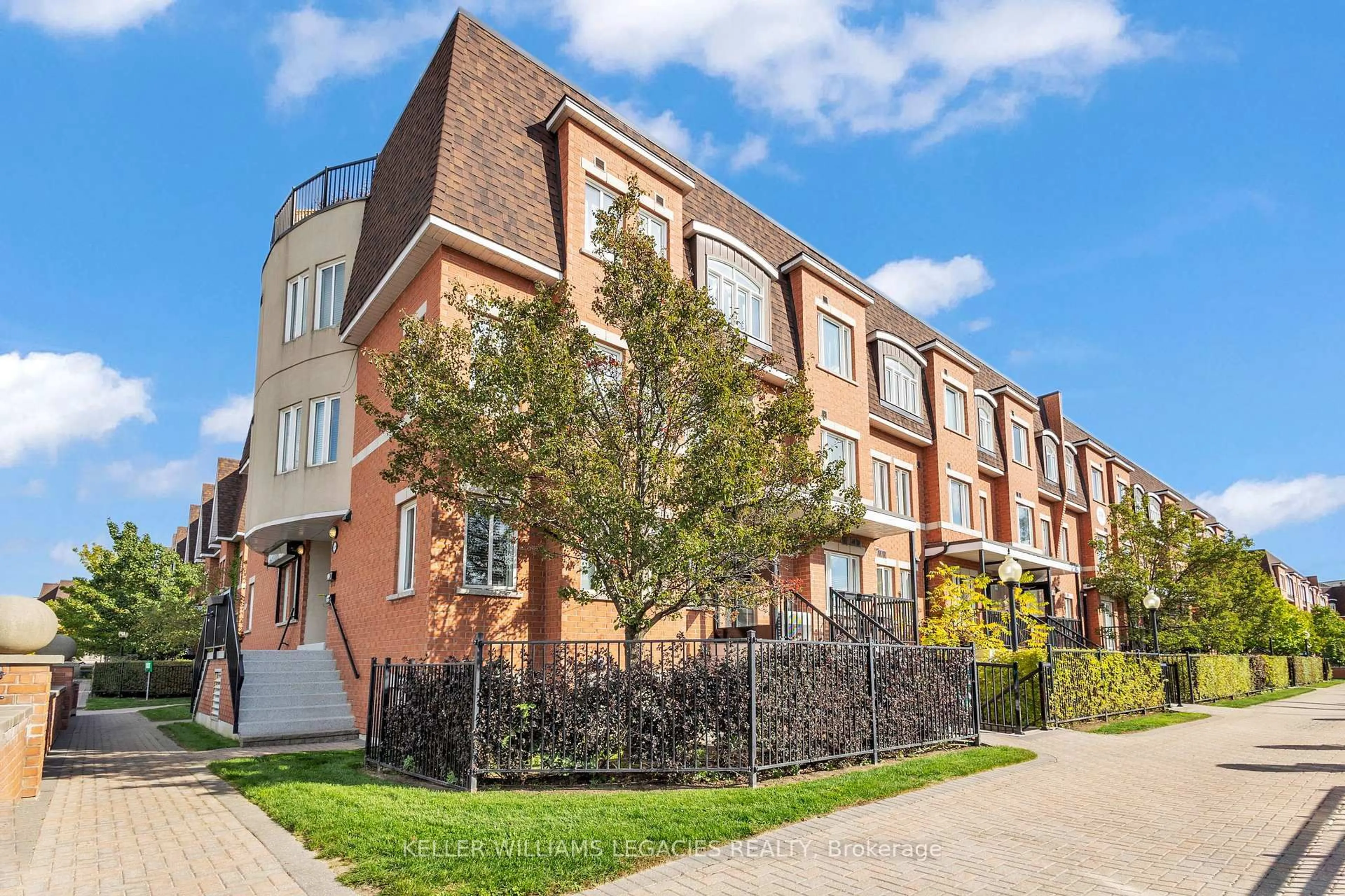 Home with brick exterior material, street for 308 John St #209, Markham Ontario L3T 0A7