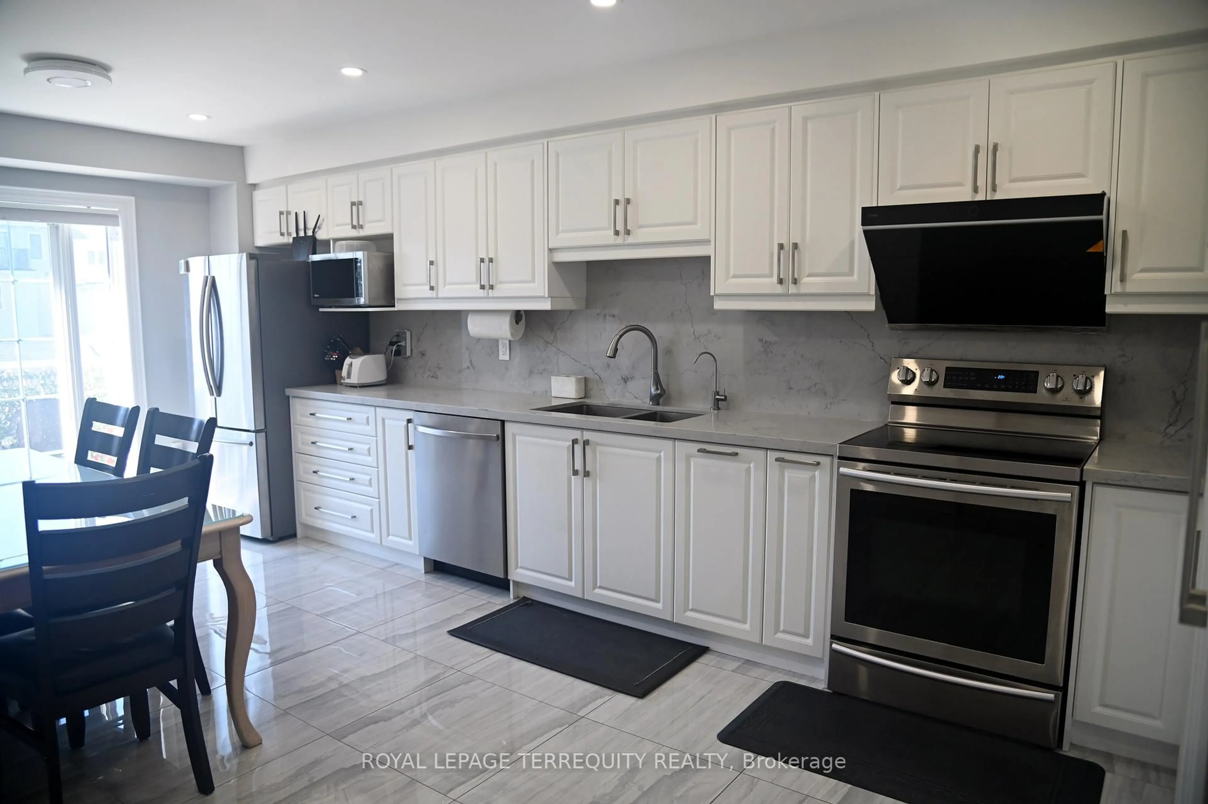 Open concept kitchen, ceramic/tile floor for 2753 Bur Oak Ave, Markham Ontario L6B 1C8