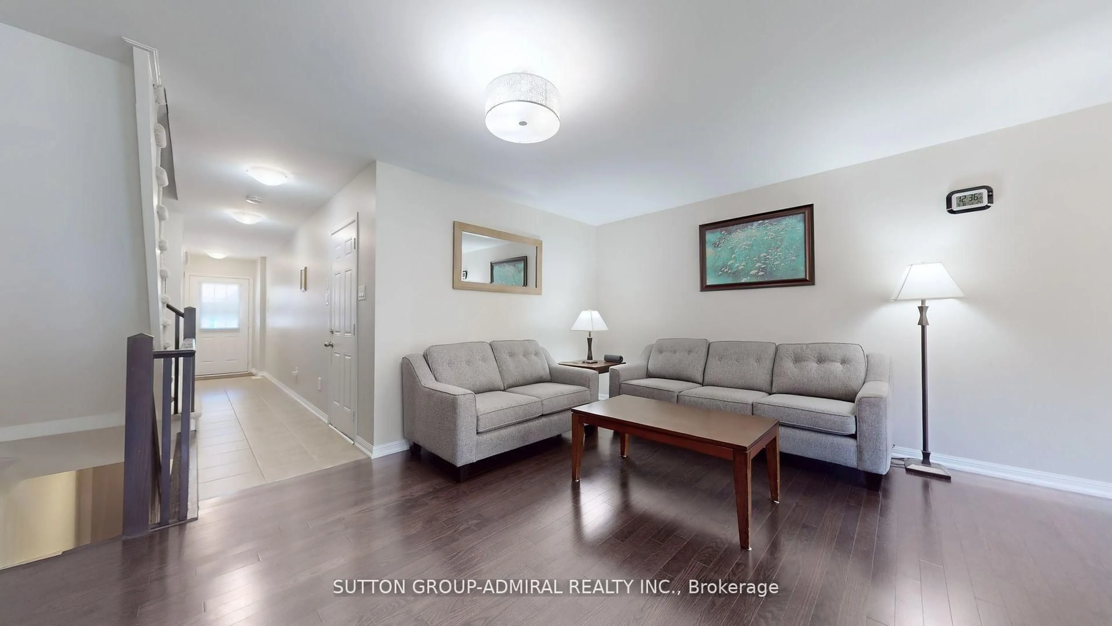 Living room with furniture, wood/laminate floor for 46 Edwin Pearson St, Aurora Ontario L4G 0S1