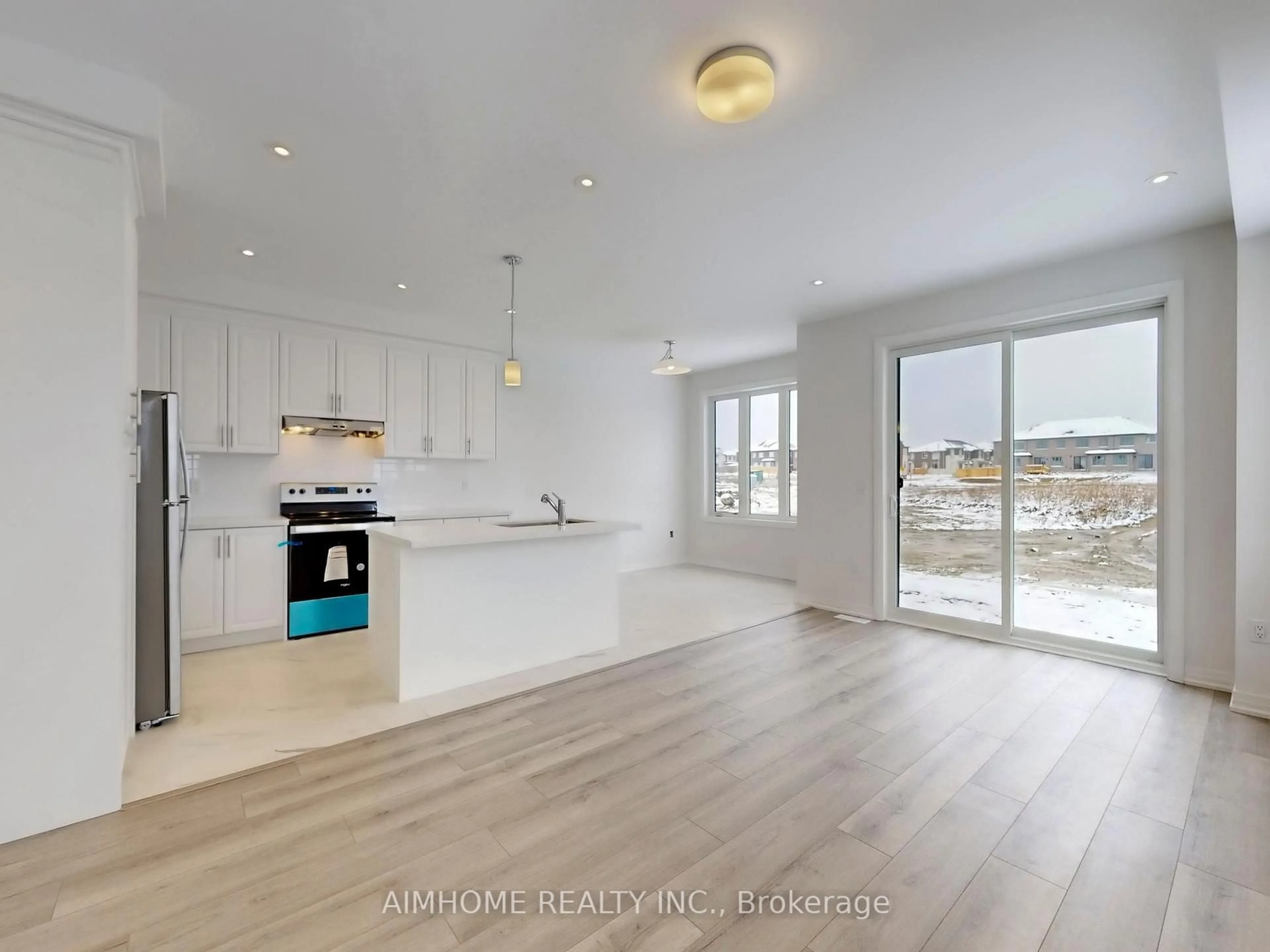 Open concept kitchen, wood/laminate floor for 34 Kamper Ave, Richmond Hill Ontario L4E 1A2