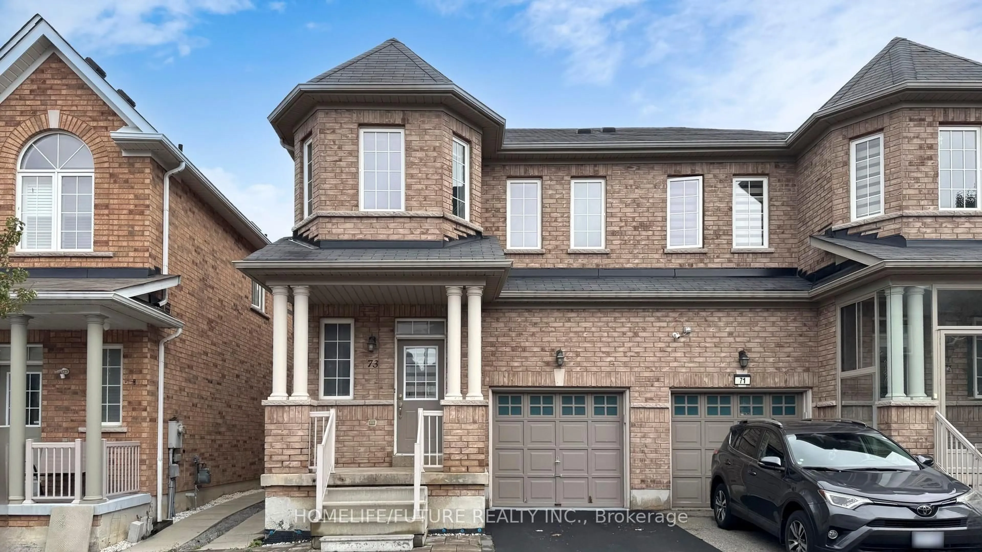 Home with brick exterior material, street for 73 Coleluke Lane, Markham Ontario L3S 0B8