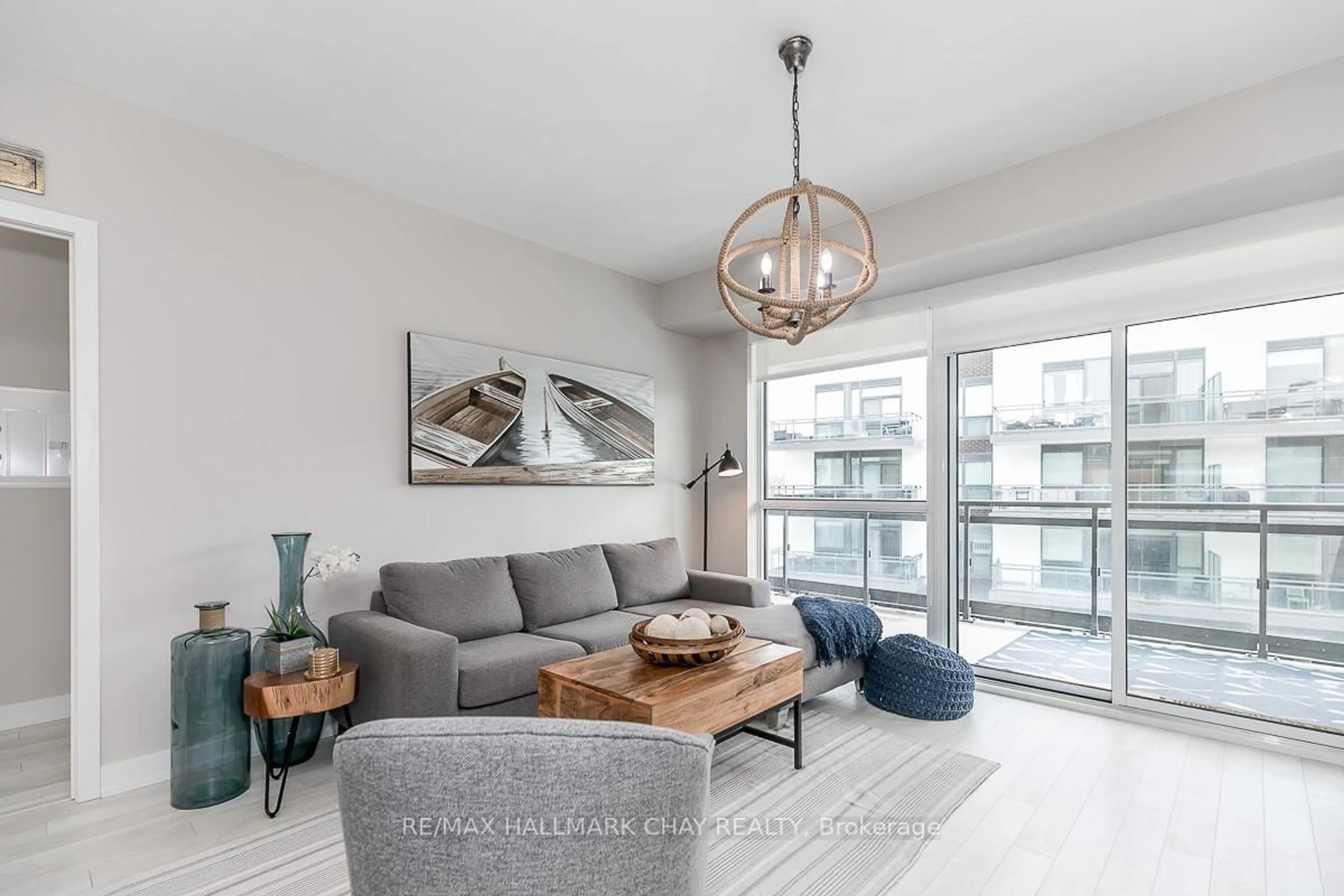 Living room with furniture, unknown for 333 Sea Ray Ave #D322, Innisfil Ontario L9S 2P7