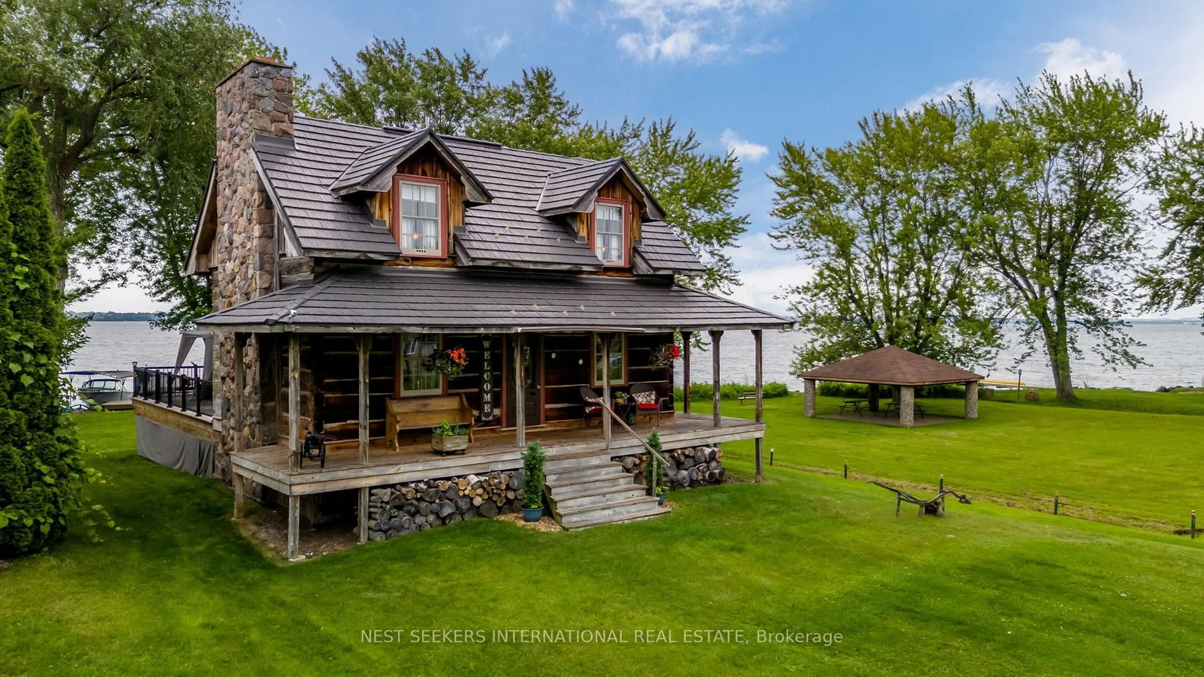 A pic from outside/outdoor area/front of a property/back of a property/a pic from drone, unknown for 219 Bayshore Rd, Innisfil Ontario L0L 1K0