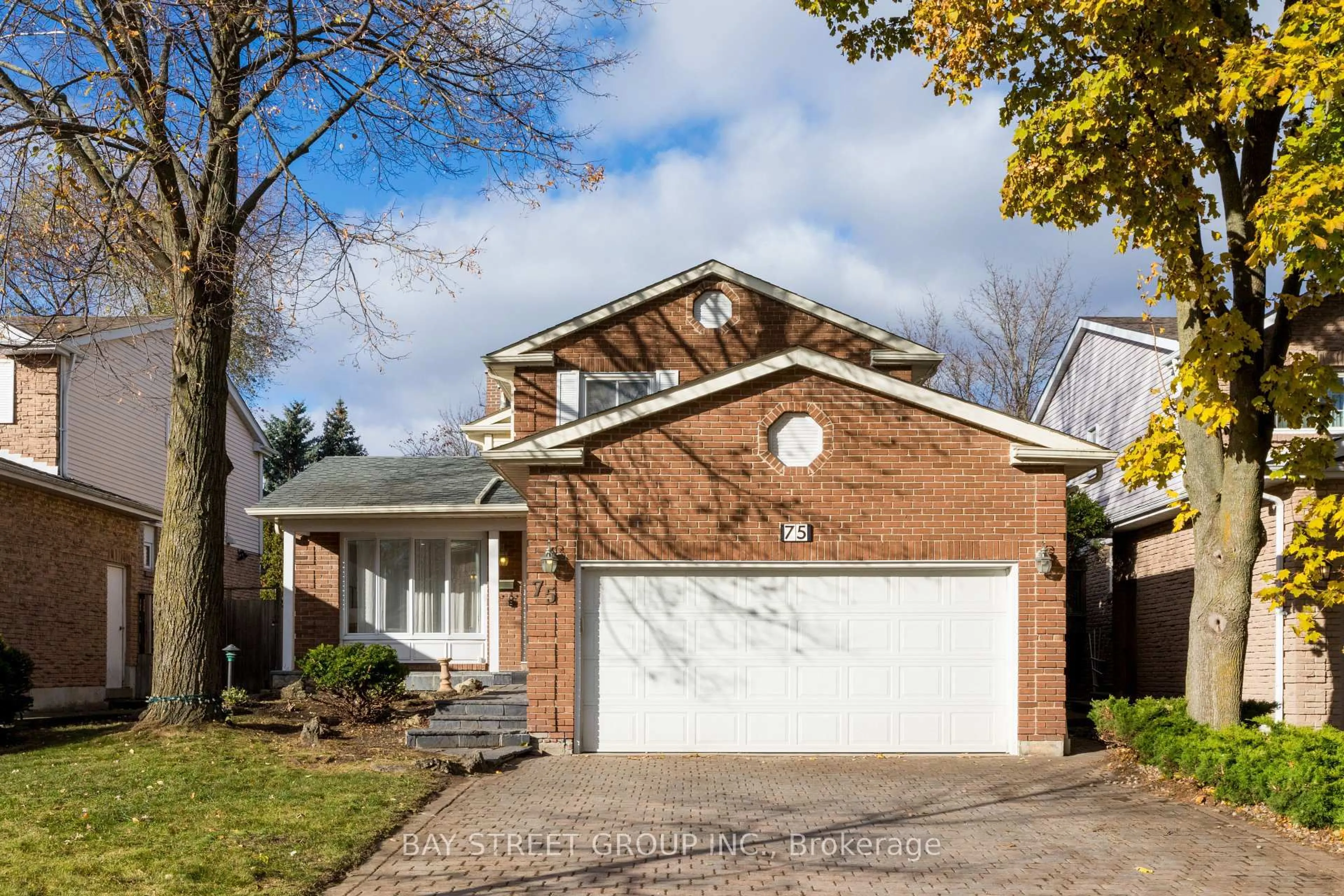 Home with brick exterior material, street for 75 Breckonwood Cres, Markham Ontario L3T 5G8